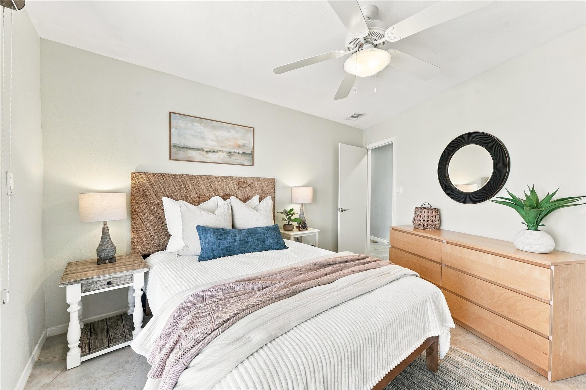 4207 Barataria Court, Galveston, TX 77554 After a day of sunshine and sandy toes, recharge in a bedroom filled with warm textures and soothing colors.