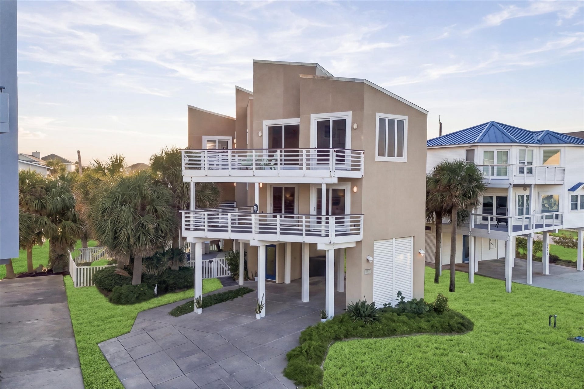 4207 Barataria Court, Galveston, TX 77554 Street view of the property. In view are two of the four private balconies.