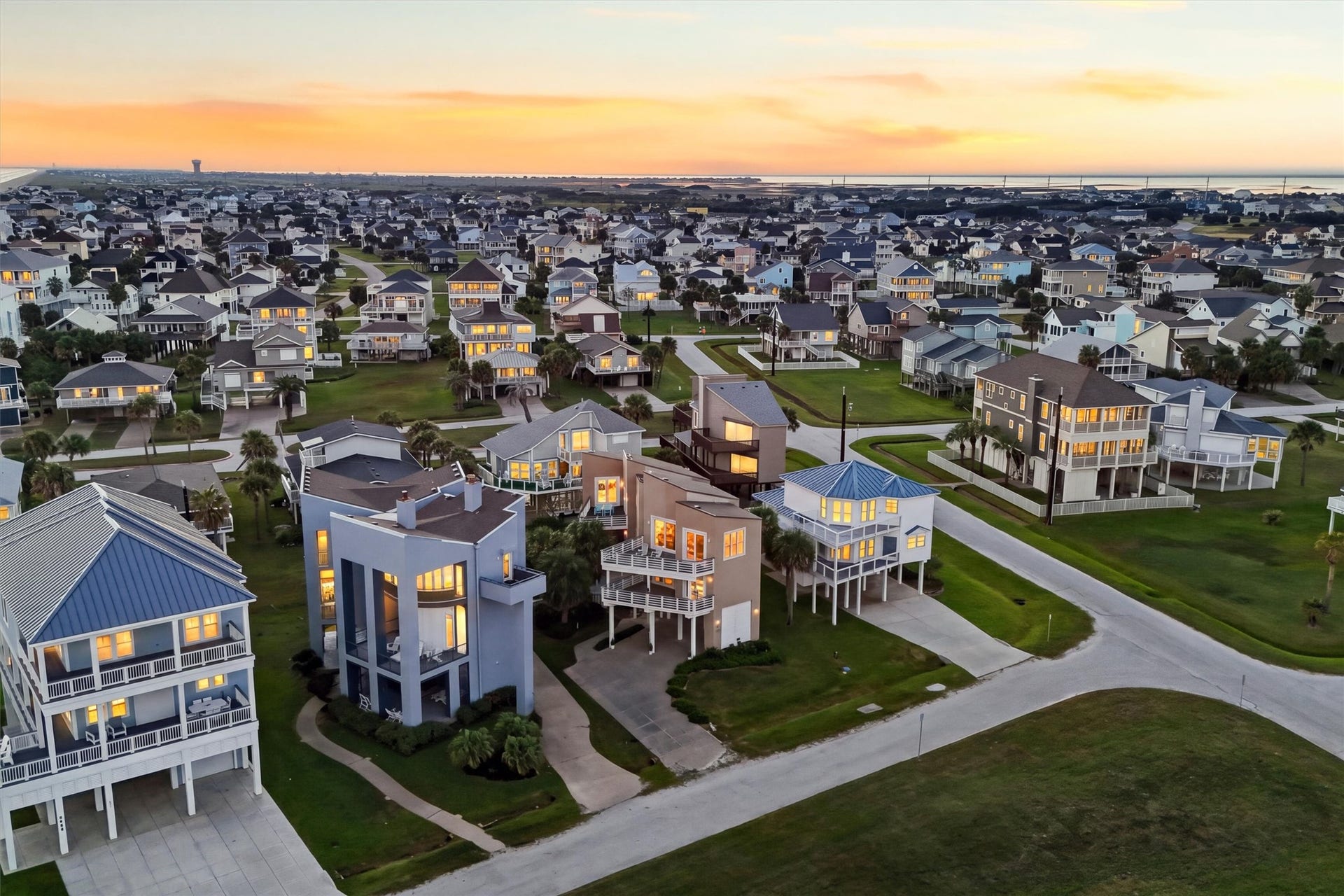 4207 Barataria Court, Galveston, TX 77554 Watch the sunrise over the beach and the sunset over the bay!