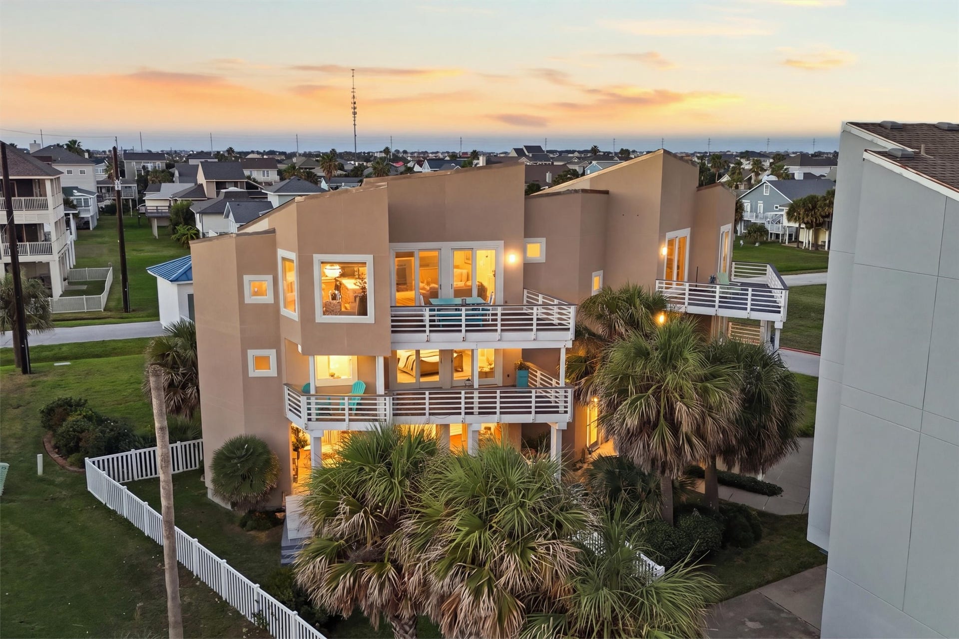 4207 Barataria Court, Galveston, TX 77554 Four inviting balconies set the scene for relaxed evenings just steps from the beach.