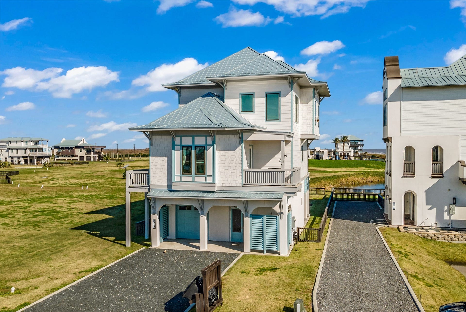 312 Seagrass, Gilchrist, TX 77617 Back at the gorgeous newly-constructed home!
