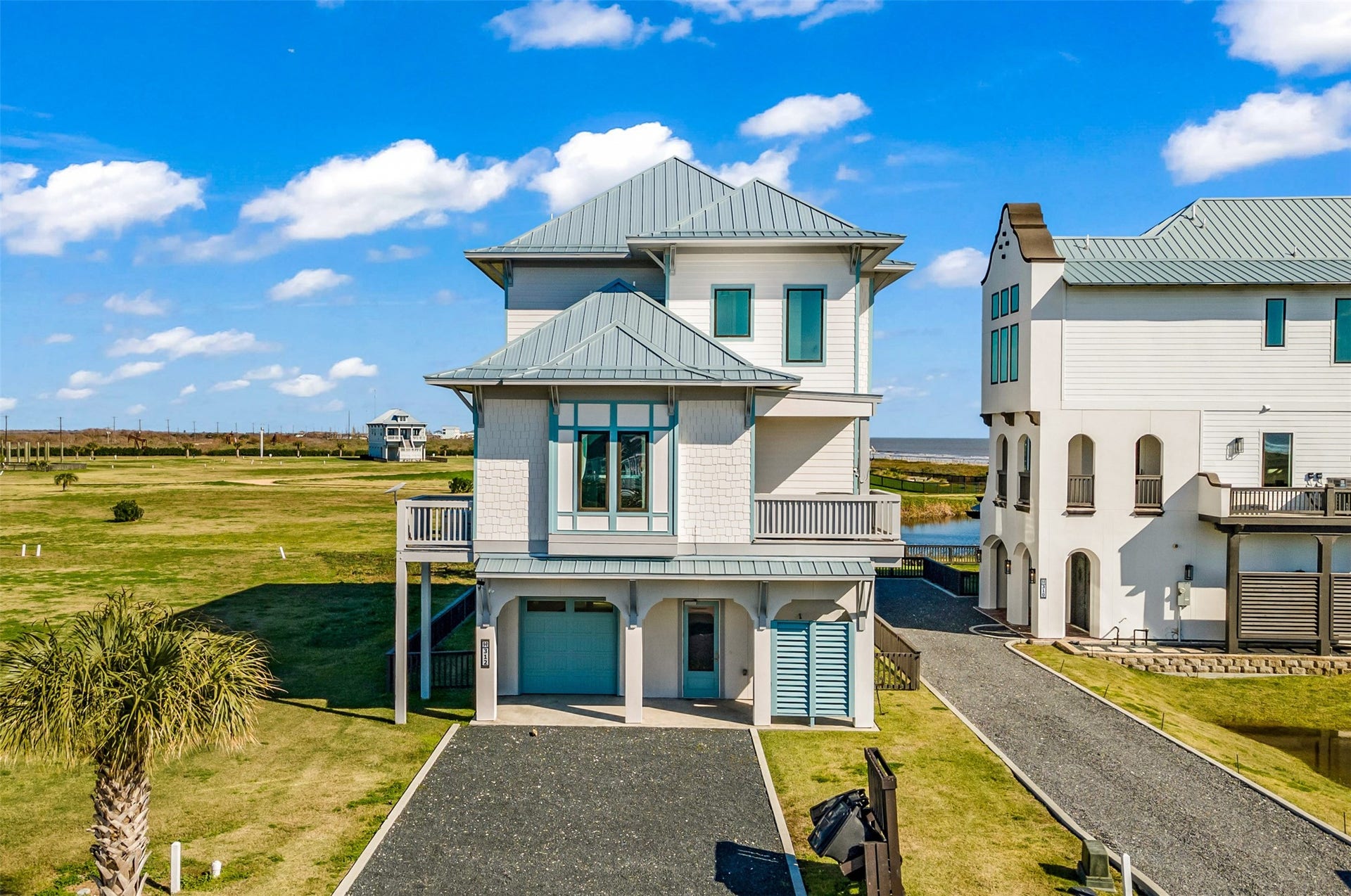 312 Seagrass, Gilchrist, TX 77617 Front view of home with 360 ocean views!