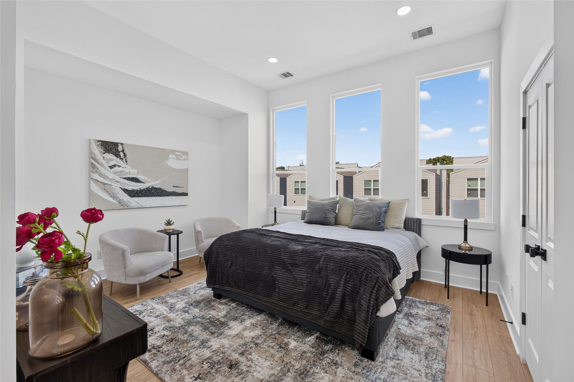 Luxurious primary retreat featuring soaring 10 foot ceilings, walk in closet, and a spa inspired en-suite bathroom.