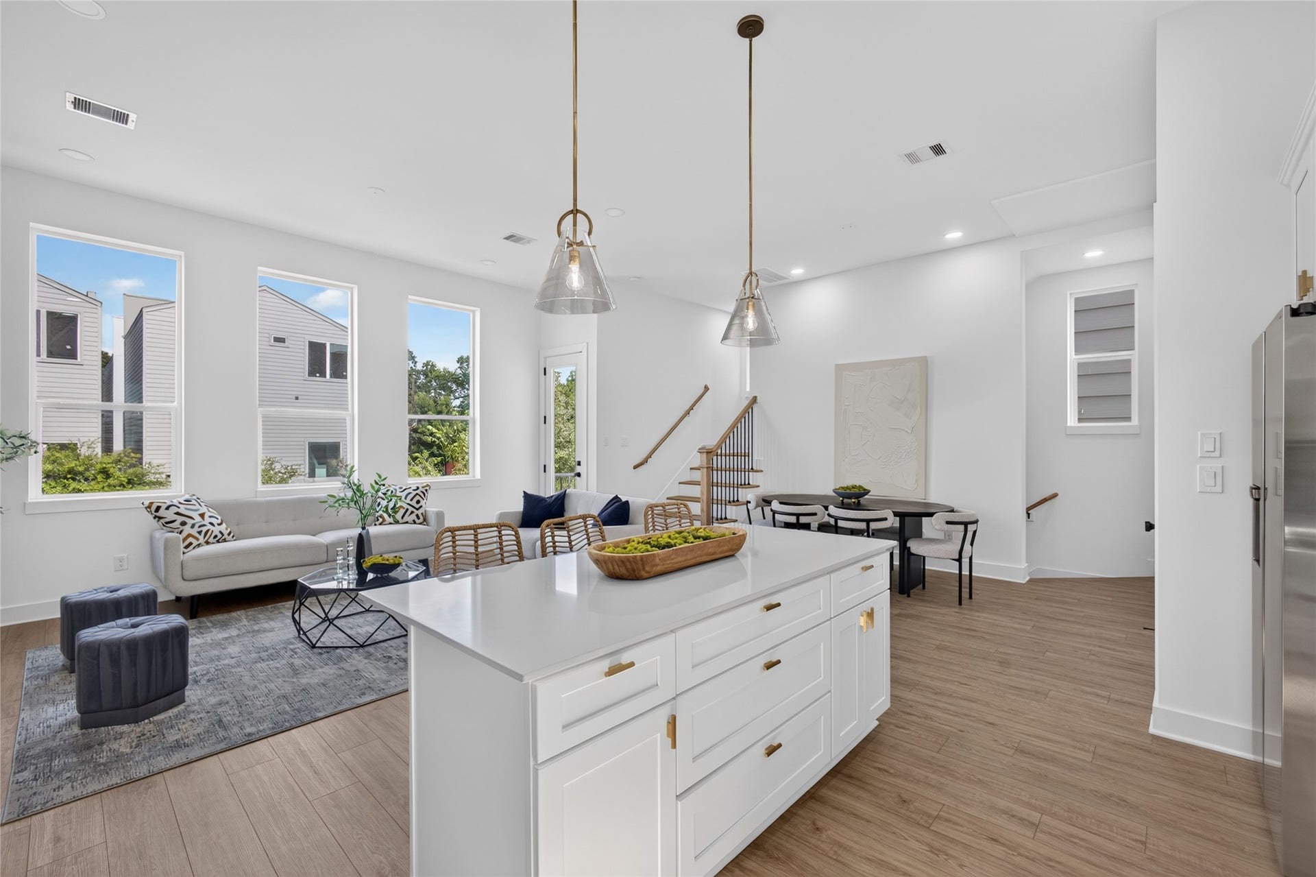 Spacious open concept kitchen with a large center island, generous storage, and premium finishes throughout.