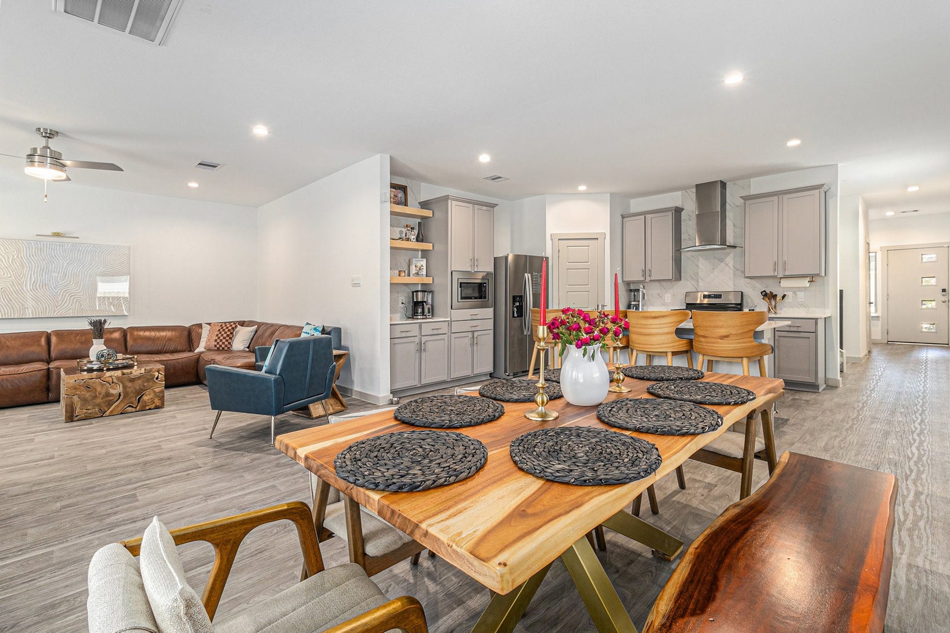 Open-concept living at its best! The kitchen, dining, and living areas flow seamlessly together, creating an inviting space for everyday living and entertaining.