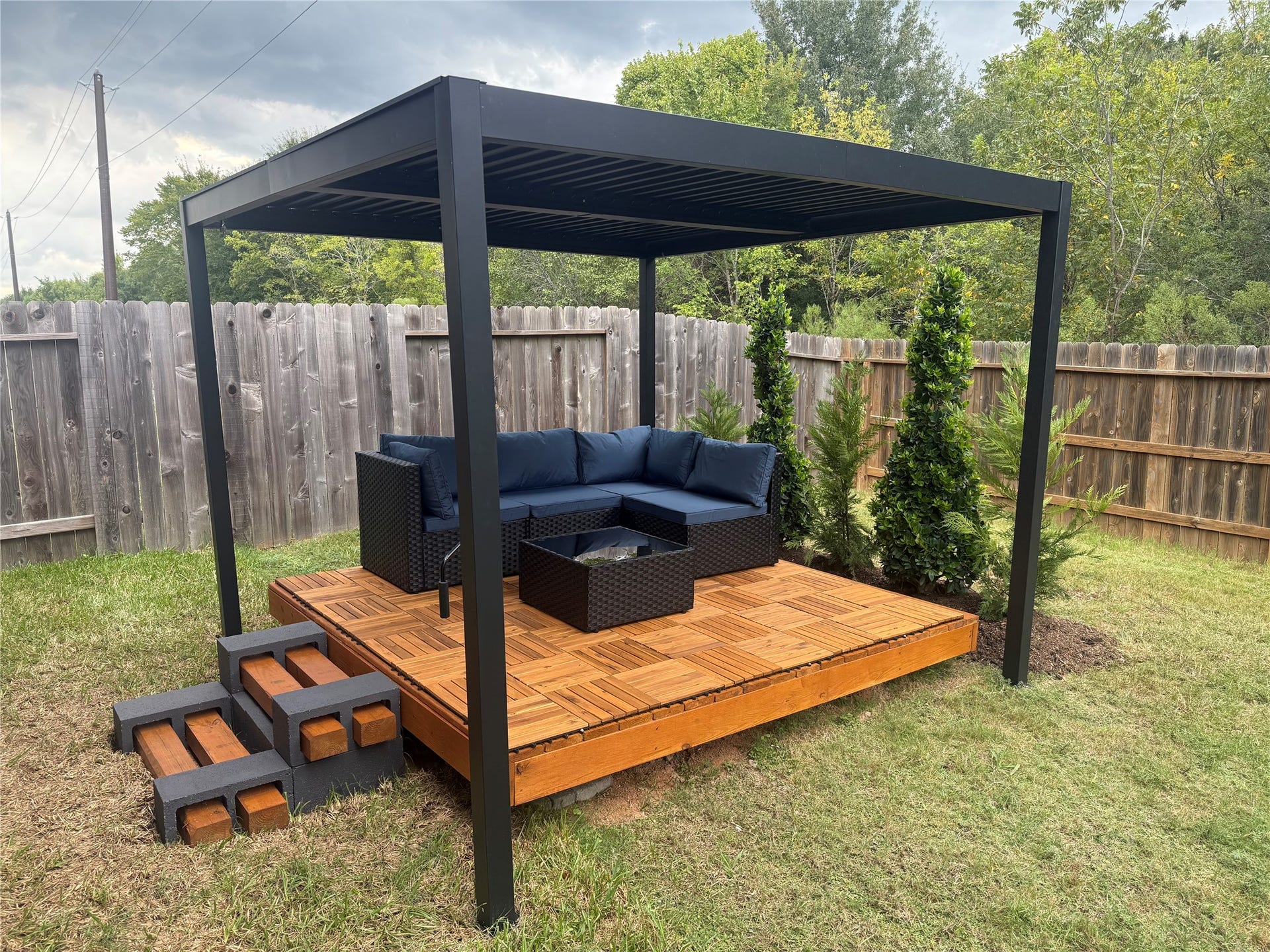 Newly added backyard deck and pergola create a comfortable outdoor living space, complete with seating area and fresh landscaping. The private backyard has no rear neighbors.