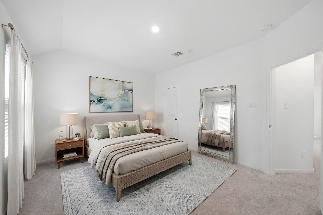 2446 Rosemary Sage Drive, Brookshire, TX 77423 Secondary Bedroom #1 is located upstairs and features a comfortable layout with plush carpeting, recessed lighting, and a large window that fills the room with natural light. A versatile and inviting space, perfect for guests. Note: this photo has been virtually staged.