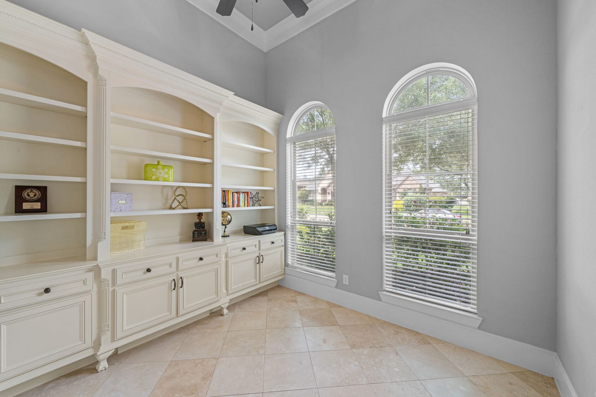 Dedicated home office with custom built-ins offering both style and functionality