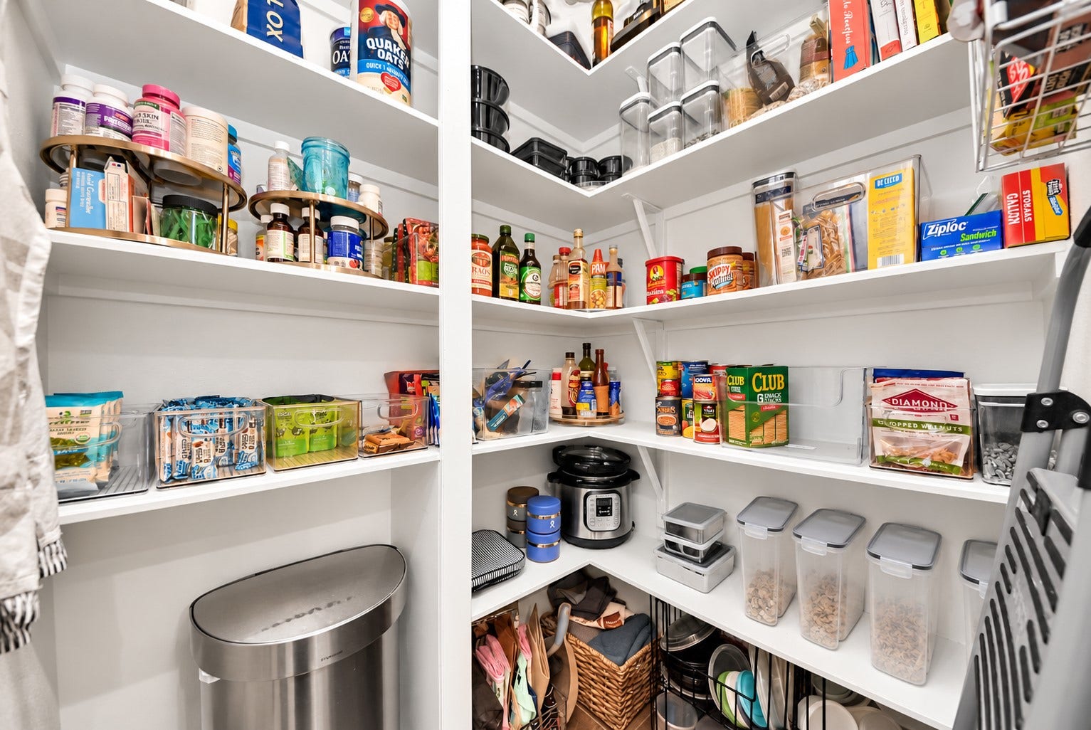 832 W 22nd Street, Houston, TX 77008 Another view of the generously sized pantry highlighting its excellent organization, multiple shelving levels, and convenient storage solutions.