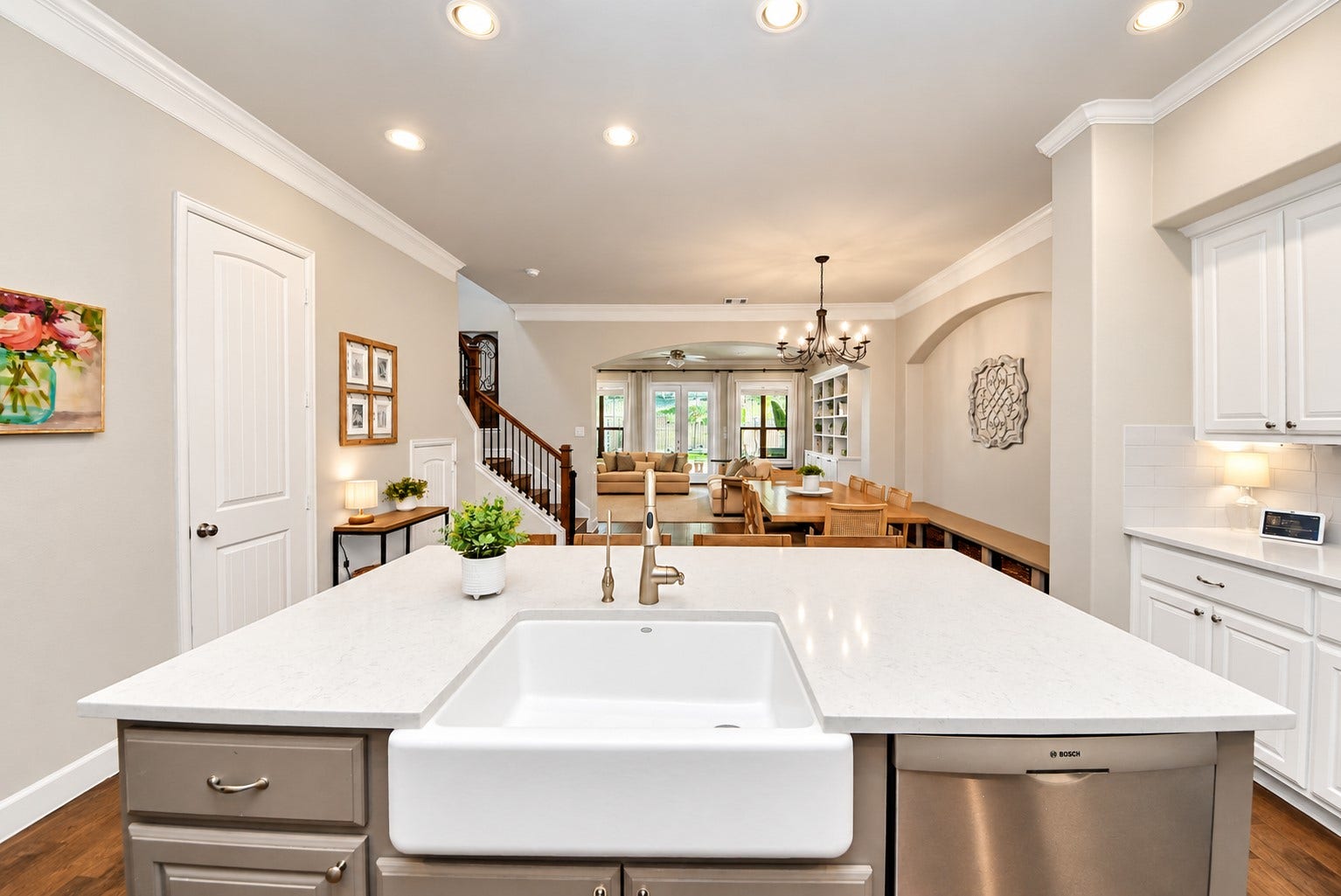 832 W 22nd Street, Houston, TX 77008 Beautiful view from the kitchen island showcasing the open-concept layout, spacious dining area, and inviting living room.