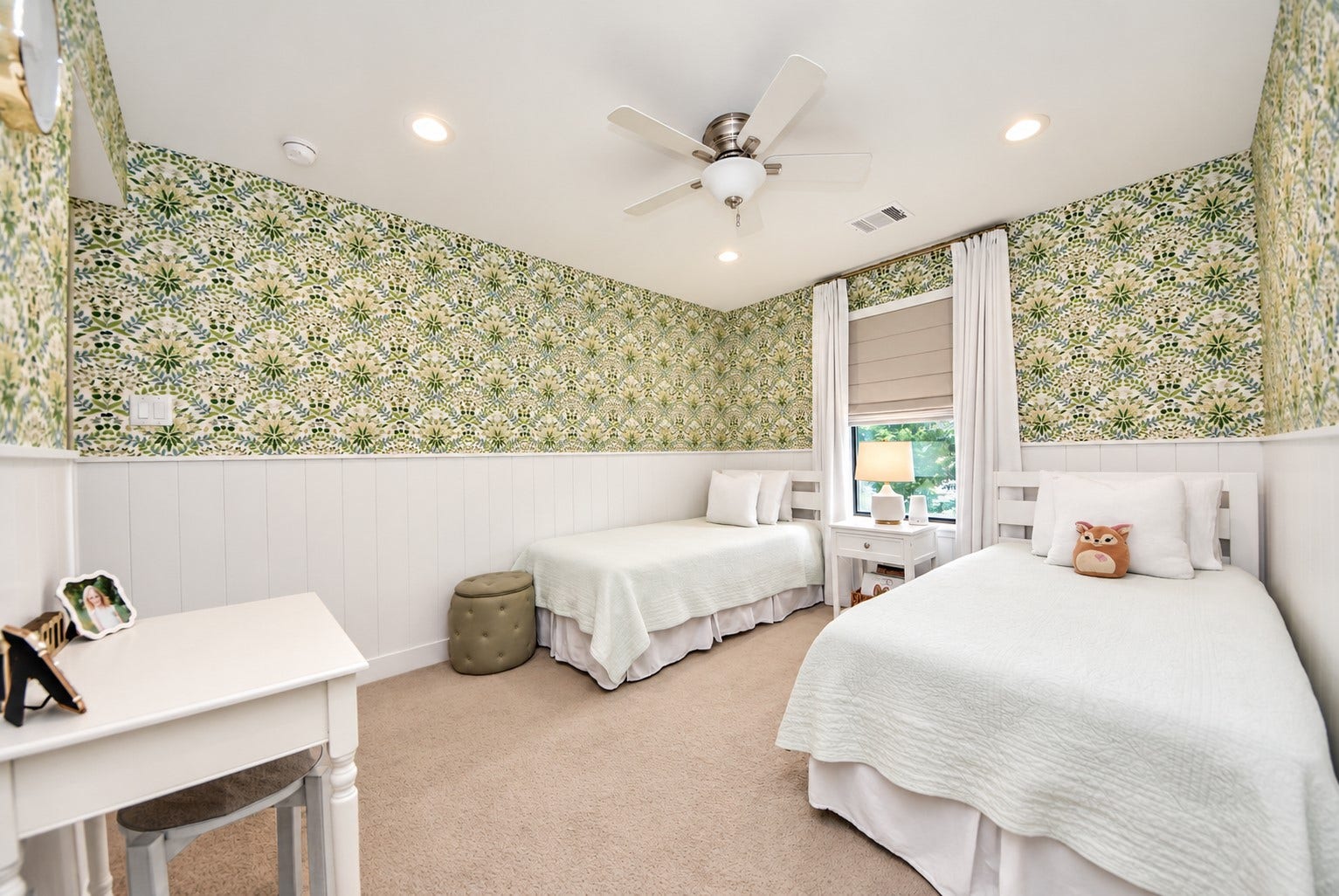 832 W 22nd Street, Houston, TX 77008 Another view highlighting the beautiful custom wallpaper, white wainscoting, and thoughtful design details that give this bedroom its distinctive charm.