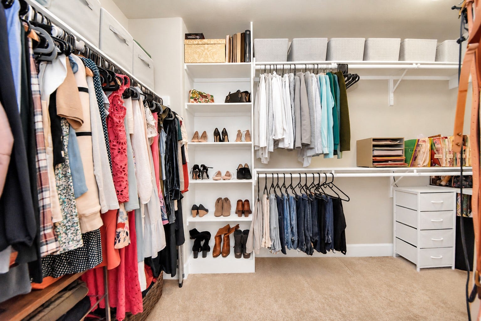 832 W 22nd Street, Houston, TX 77008 Spacious primary walk-in closet featuring extensive hanging space, built-in shelving, and organized storage for clothing, shoes, and accessories.