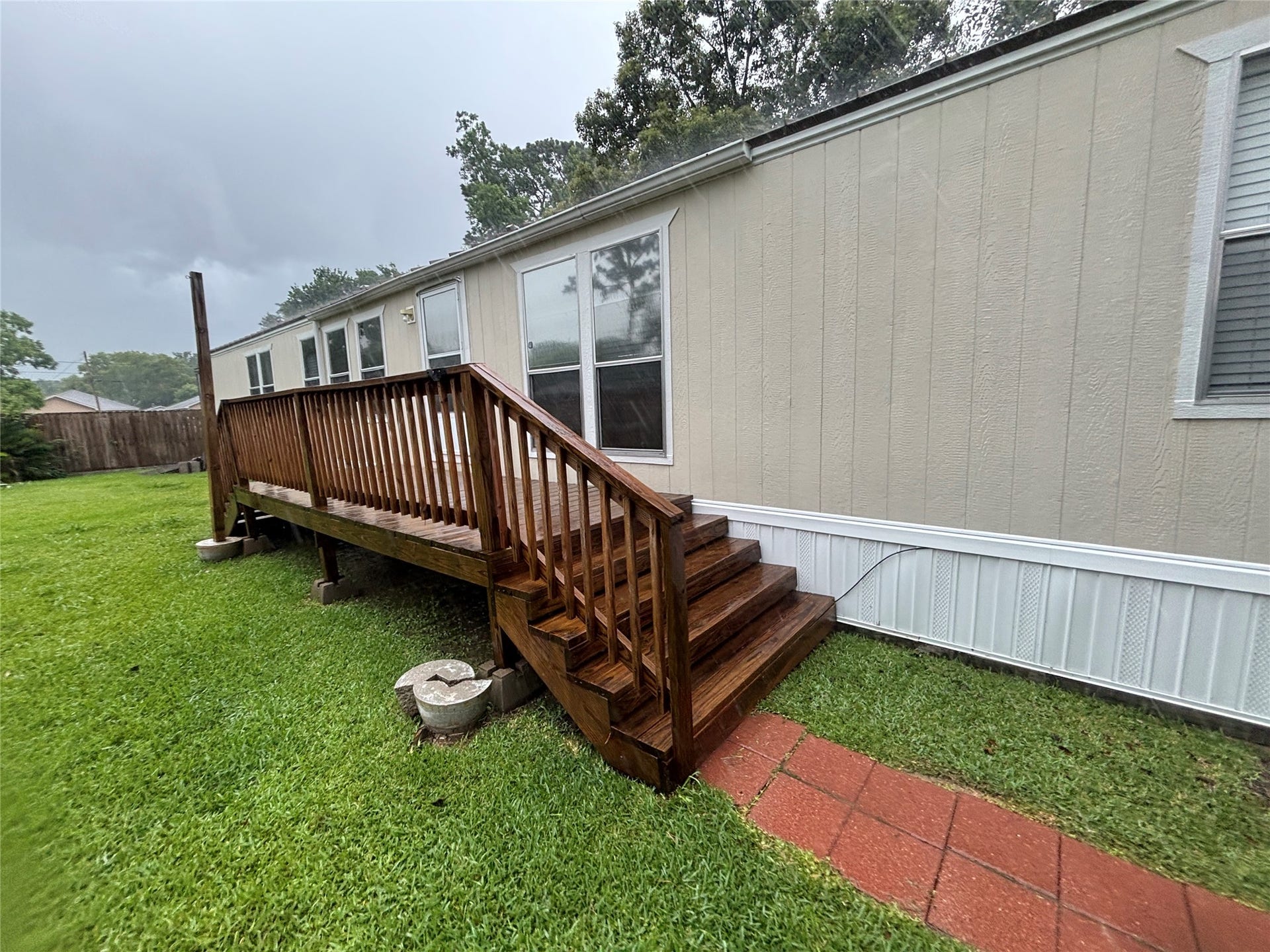 4715 3rd Street, Bacliff, TX 77518 The deck area is great for sitting outside and enjoying the view of the over-sized yard.