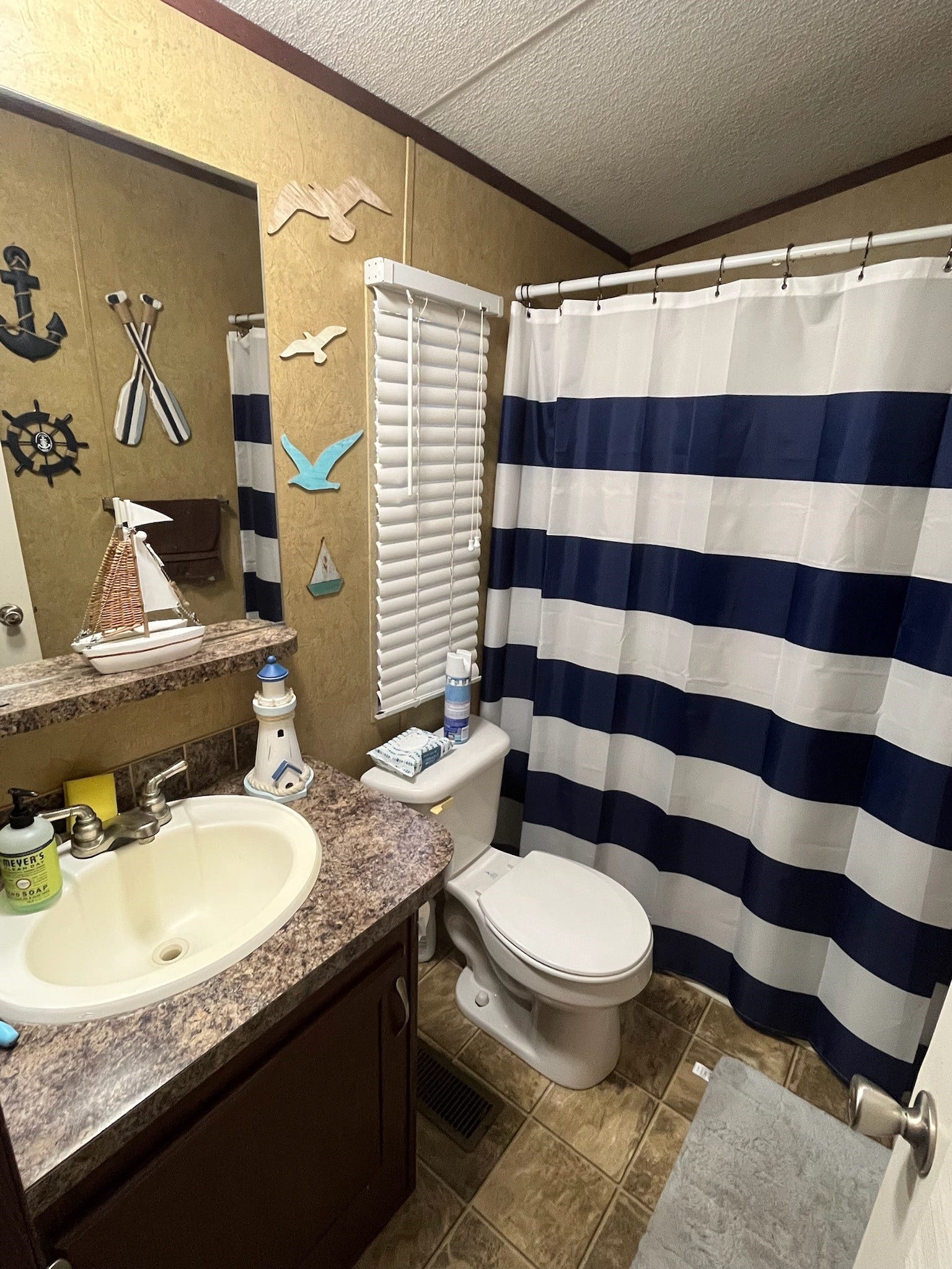 4715 3rd Street, Bacliff, TX 77518 The secondary bath has a tub/shower combo and a single vanity/sink.