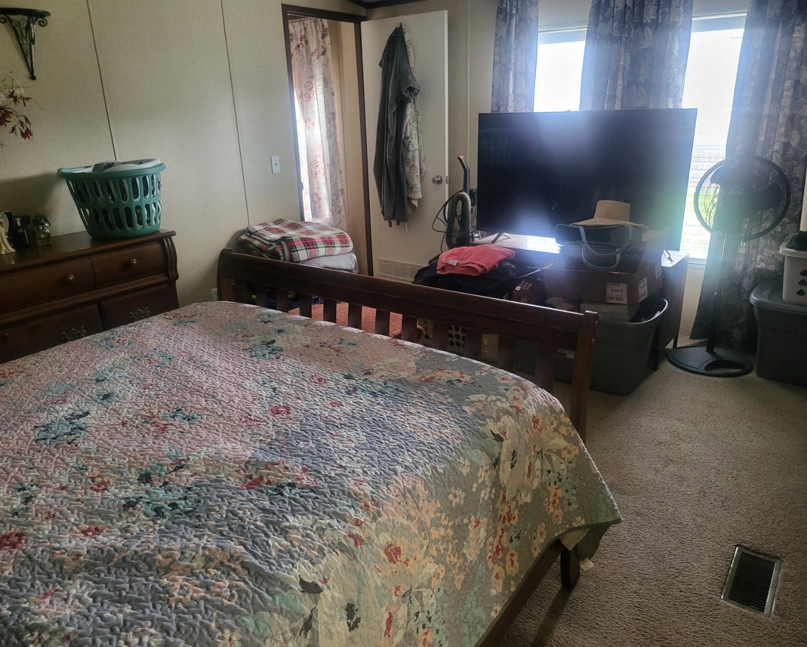 4715 3rd Street, Bacliff, TX 77518 The primary bedroom comfortably accommodates a queen-size bed, full dresser and a large tv with room left over.