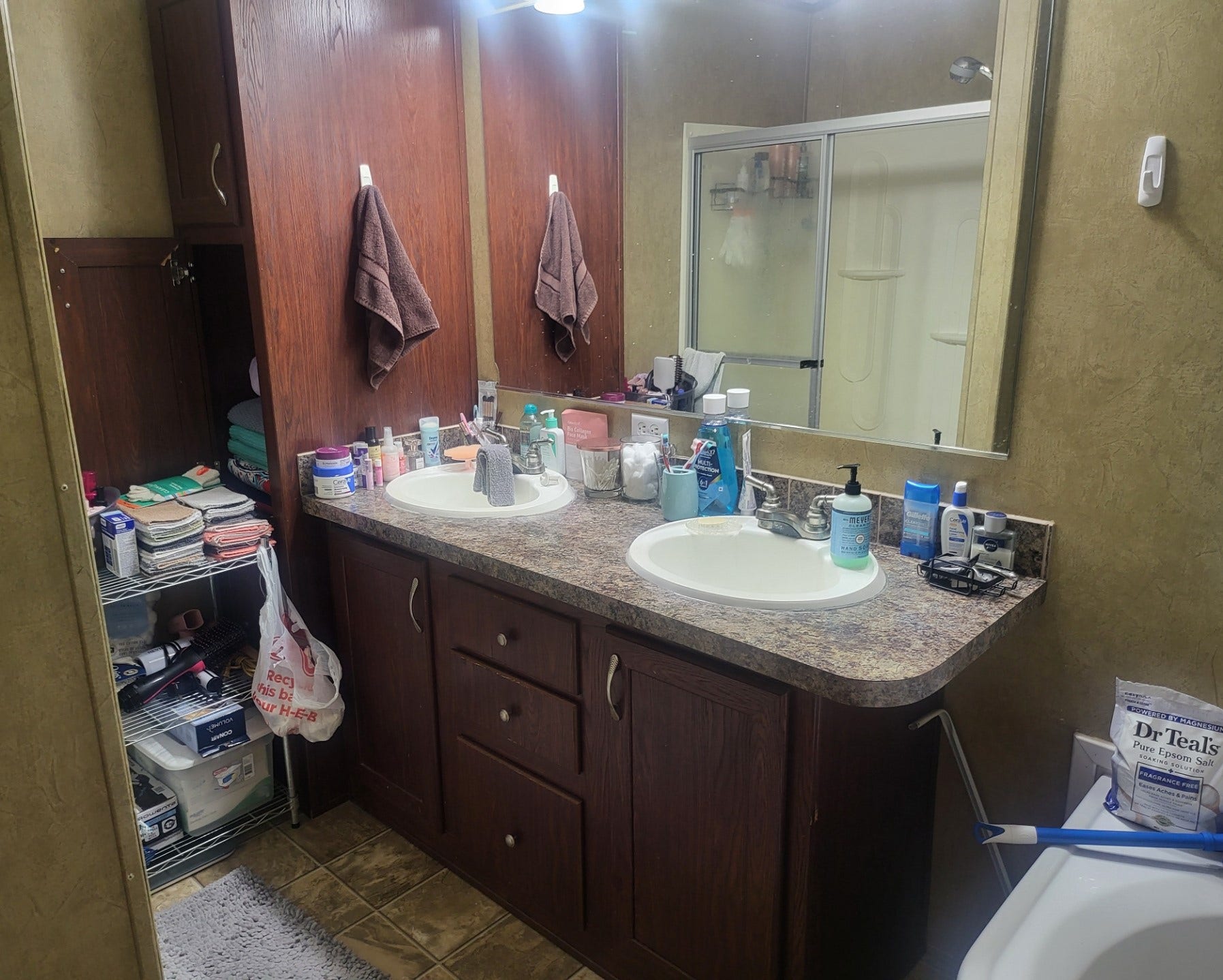 4715 3rd Street, Bacliff, TX 77518 The primary bath has double sinks, a full-size walk-in shower and comfortable soaker tub.