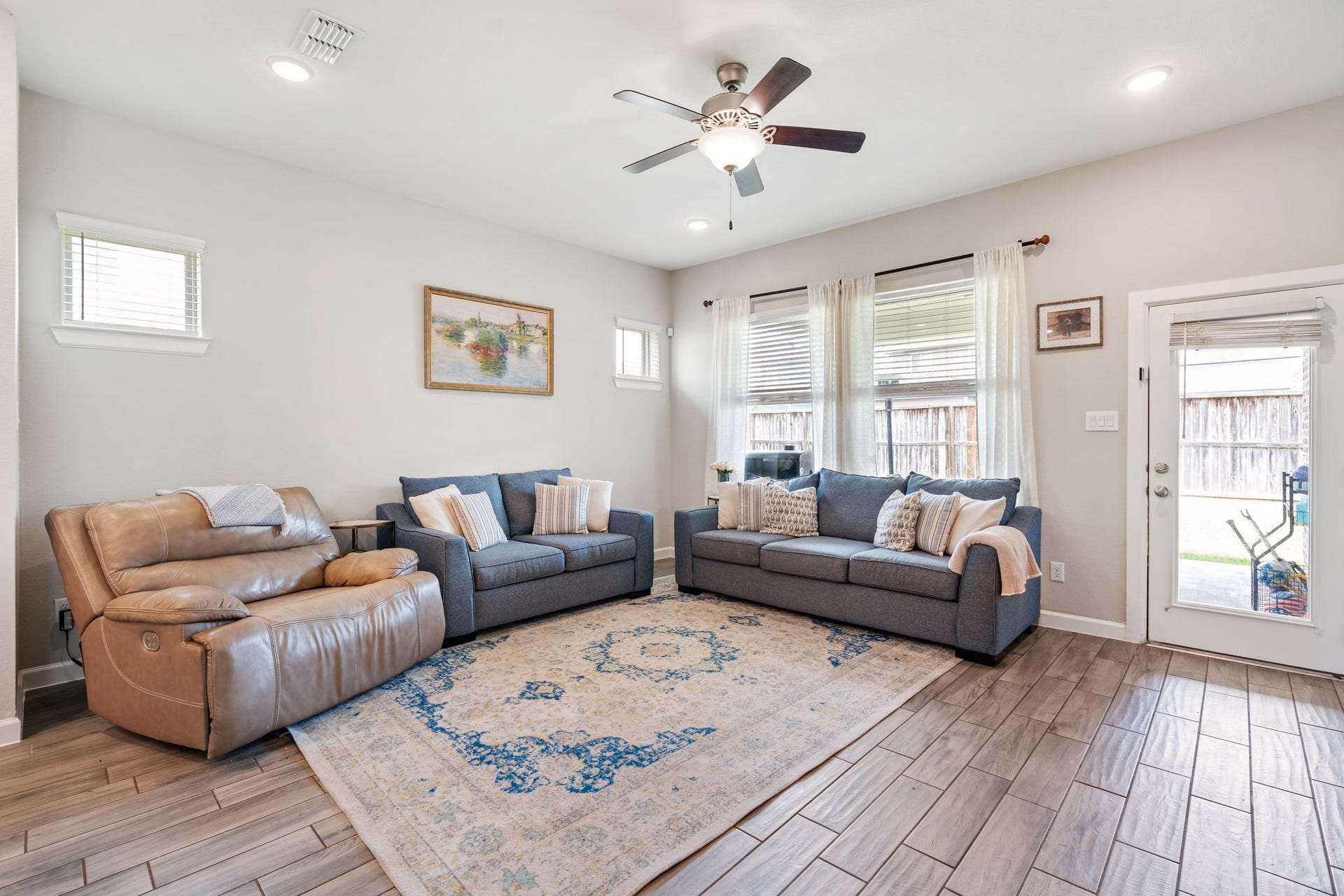 Large living space with plenty of natural light.