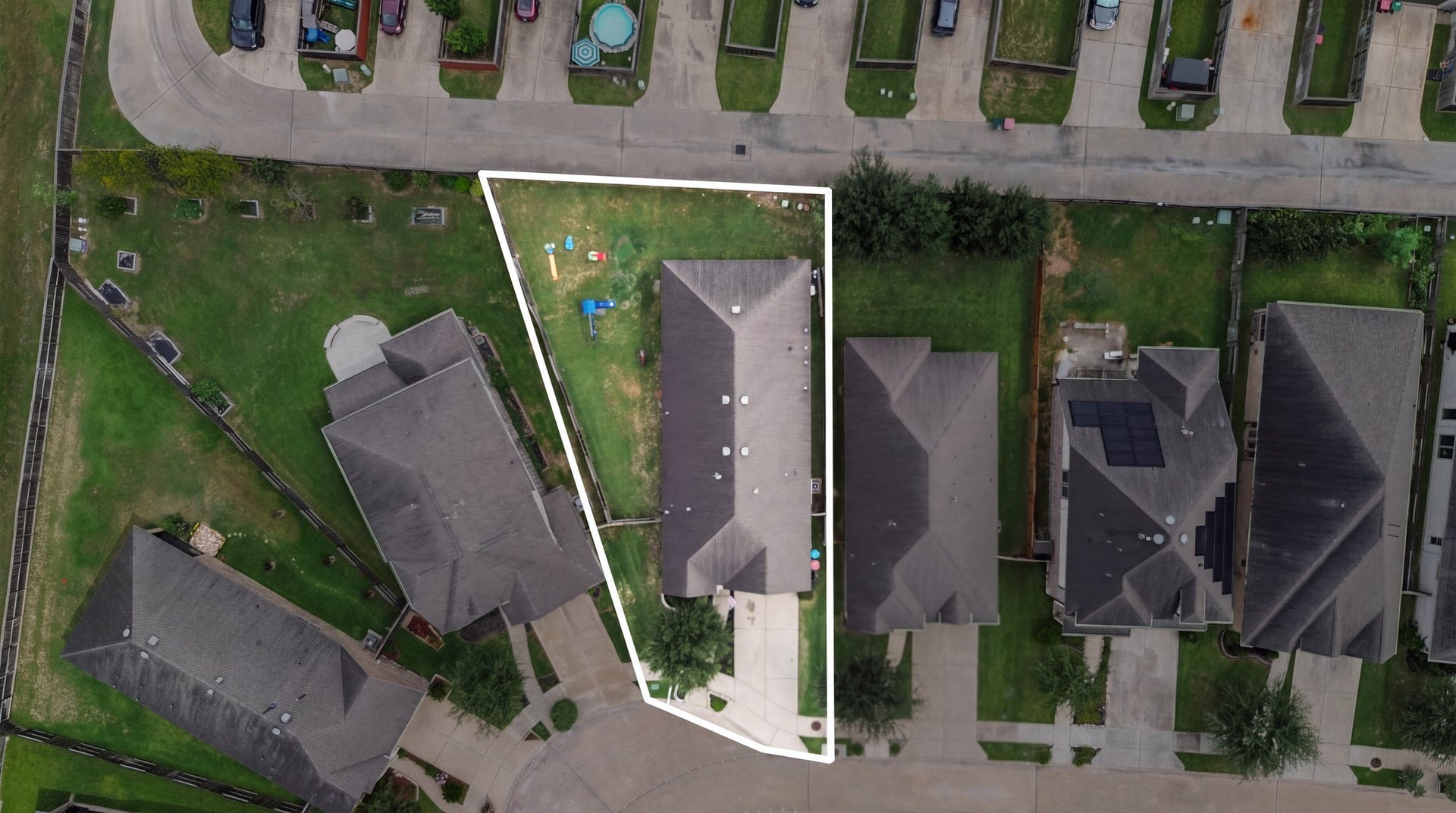 An oversized lot with a side yard perfect for play!