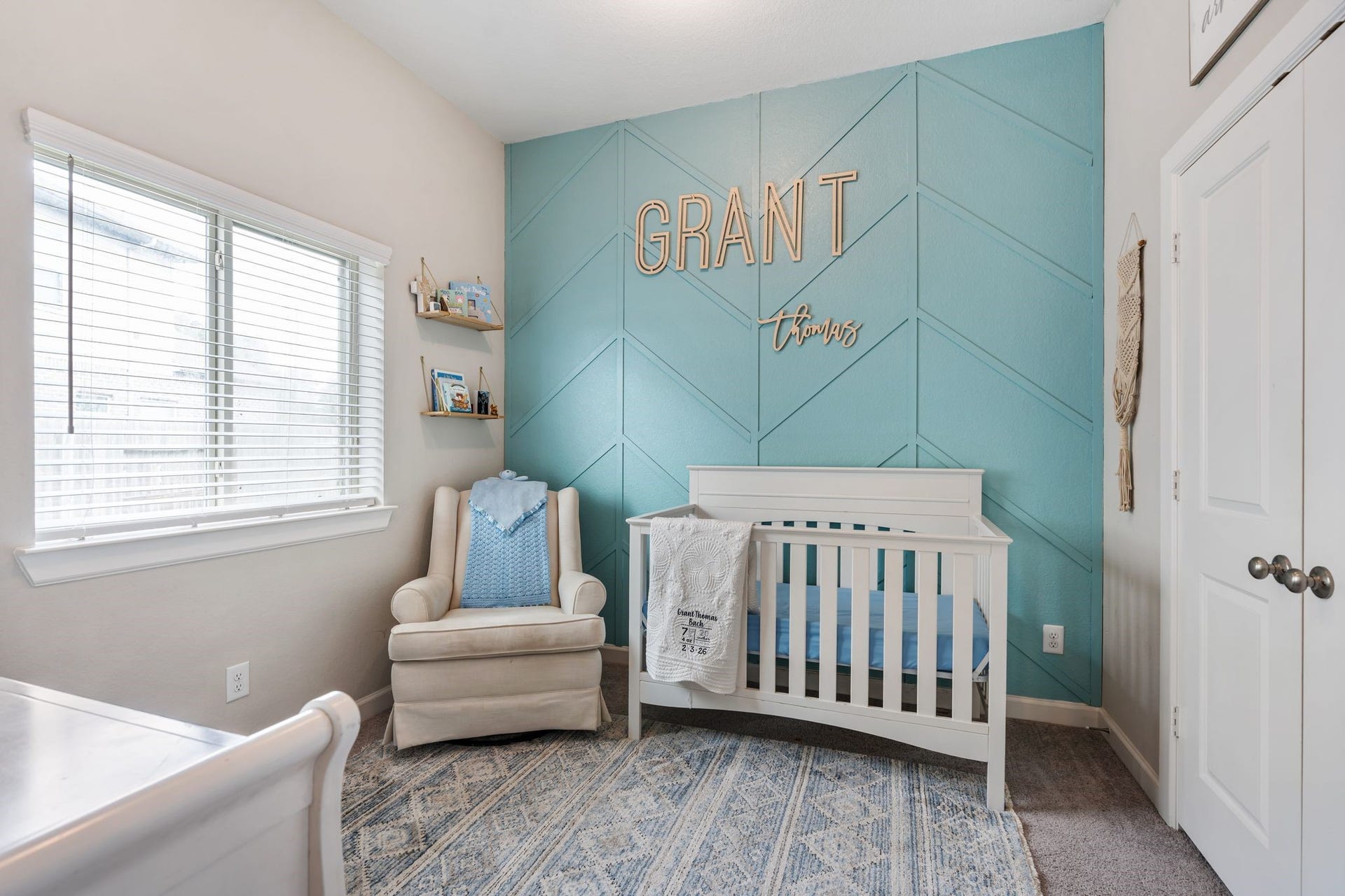 Bedroom 2 follows right after bathroom 1 and contains a stunning feature wall.