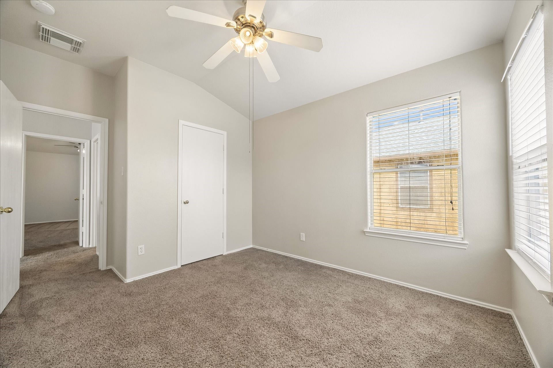 223 Sunset Colony Drive, Rosharon, TX 77583 Fresh, neutral and easy to make your own, this guest bedroom offers a comfortable layout, soft carpet, a cooling fan and a large closet for everyday storage.