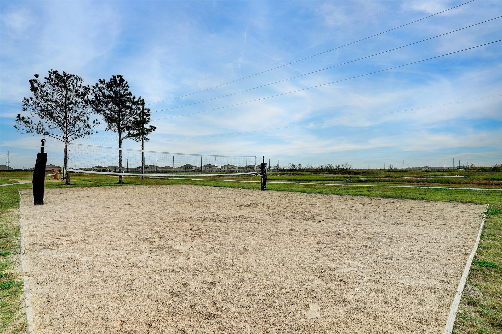 223 Sunset Colony Drive, Rosharon, TX 77583 Grab a few friends and make a game of it on the neighborhood sand volleyball court.