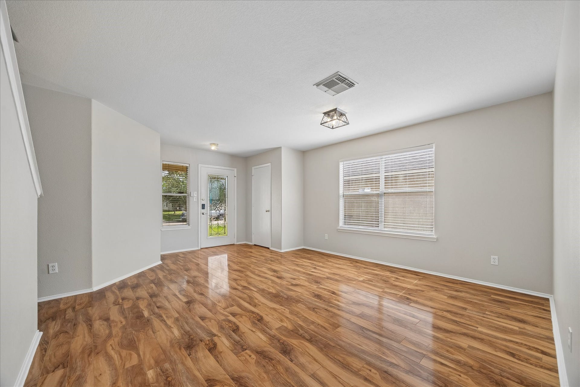 223 Sunset Colony Drive, Rosharon, TX 77583 Step inside to fresh, inviting interiors where laminate flooring and a light neutral palette set the tone for a flexible floor plan designed to fit the way you live.