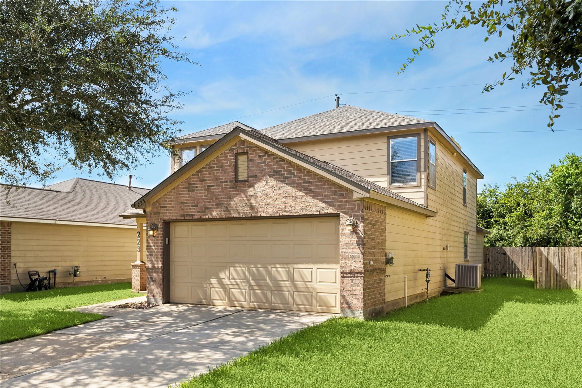 223 Sunset Colony Drive, Rosharon, TX 77583 The 2-car garage with epoxy flooring and remote openers makes coming and going a little easier, while the sprinkler system helps keep the yard looking good so you can spend your weekends enjoying it instead of dragging sprinklers around.