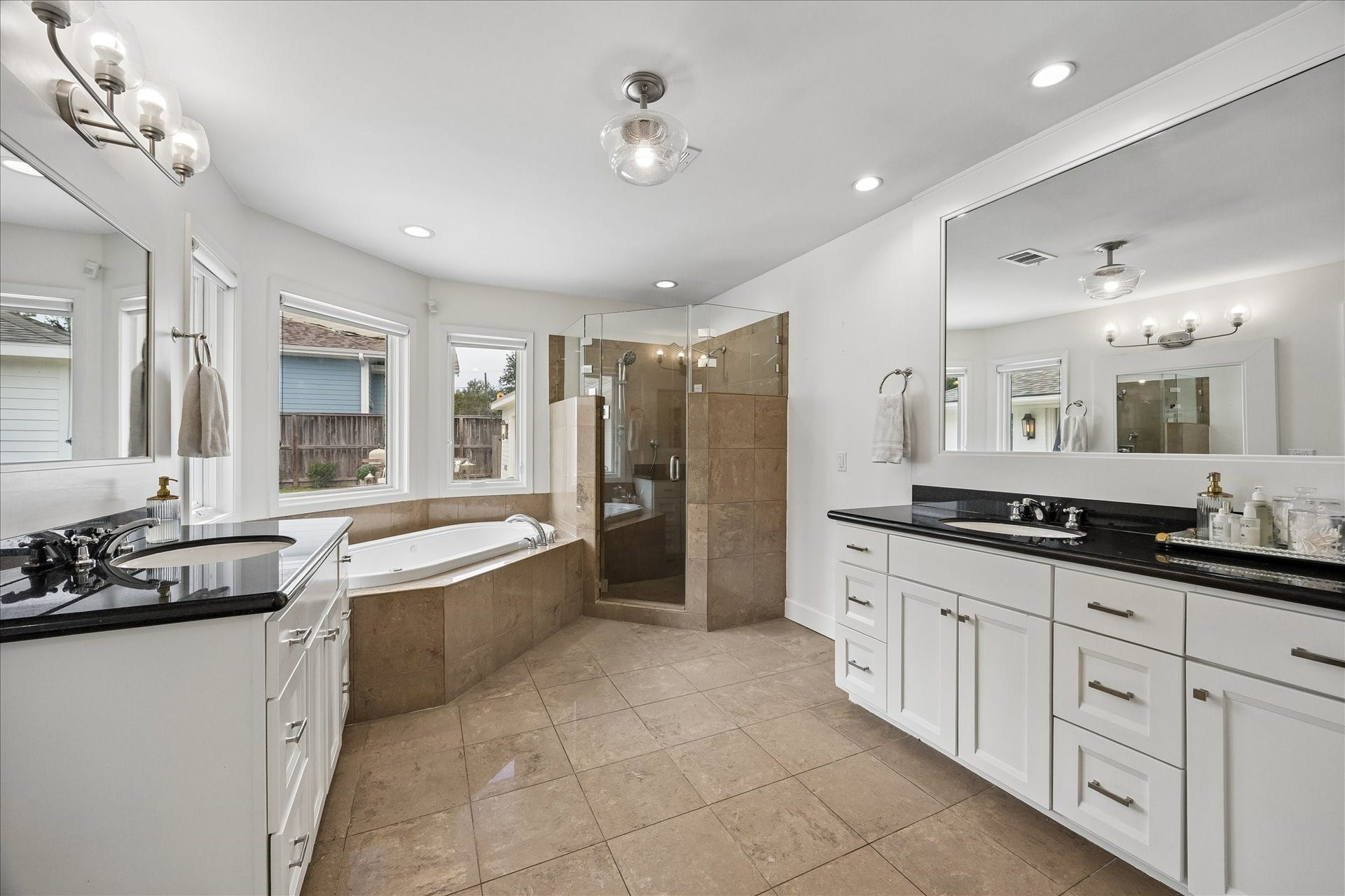 3702 Linkwood Drive, Houston, TX 77025 Dual vanities, jetted tub, and separate shower in this nicely sized primary bath.