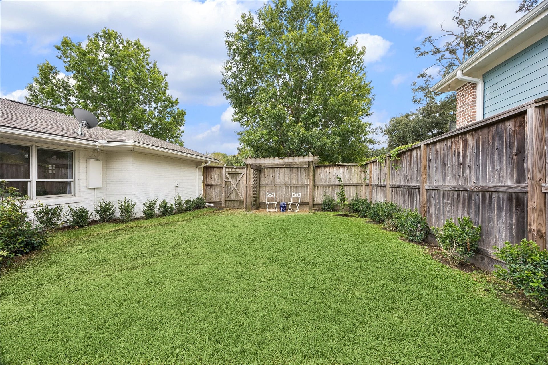 3702 Linkwood Drive, Houston, TX 77025 The enormous lots allows for a generous amount of green space alongside the pool.