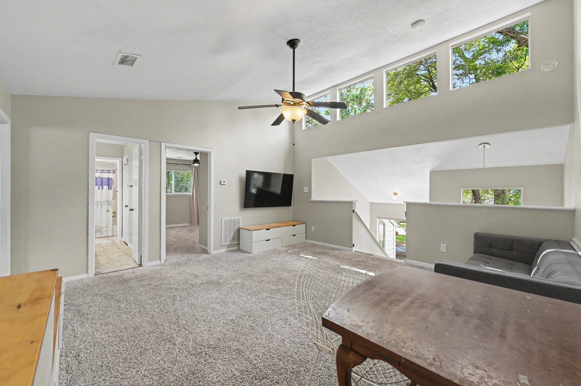 2314 Chestnut Oak Place, The Woodlands, TX 77380 The spacious game room connects the two upstairs bedrooms and bath, creating a comfortable and functional second floor retreat.