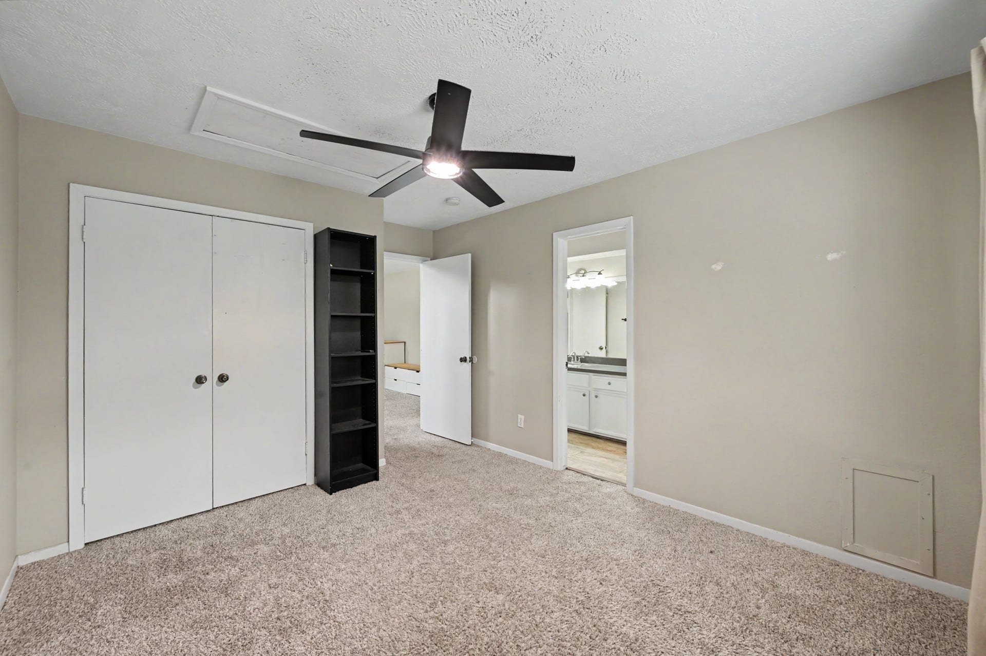 2314 Chestnut Oak Place, The Woodlands, TX 77380 Another view highlights the bedrooms space, large closet and convenient access to the shared bath.
