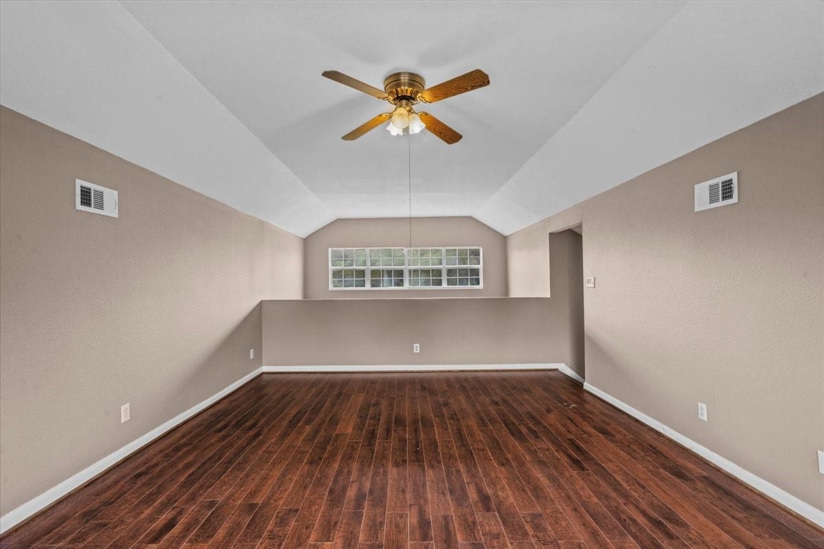 7228 Avenue R, Santa Fe, TX 77510 Game Room/loft area looking down on the living room.
