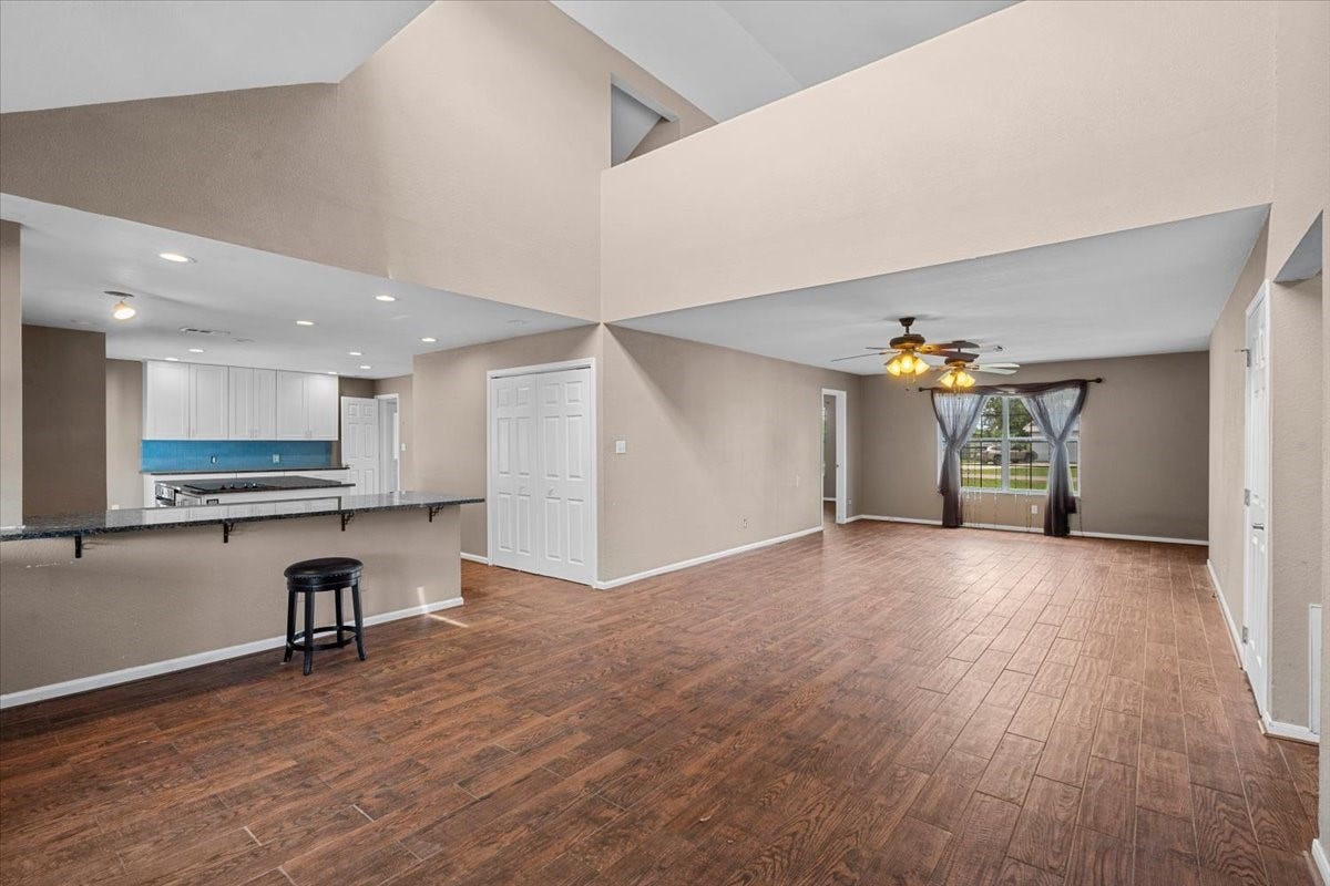 7228 Avenue R, Santa Fe, TX 77510 Dining area looking into the living room.