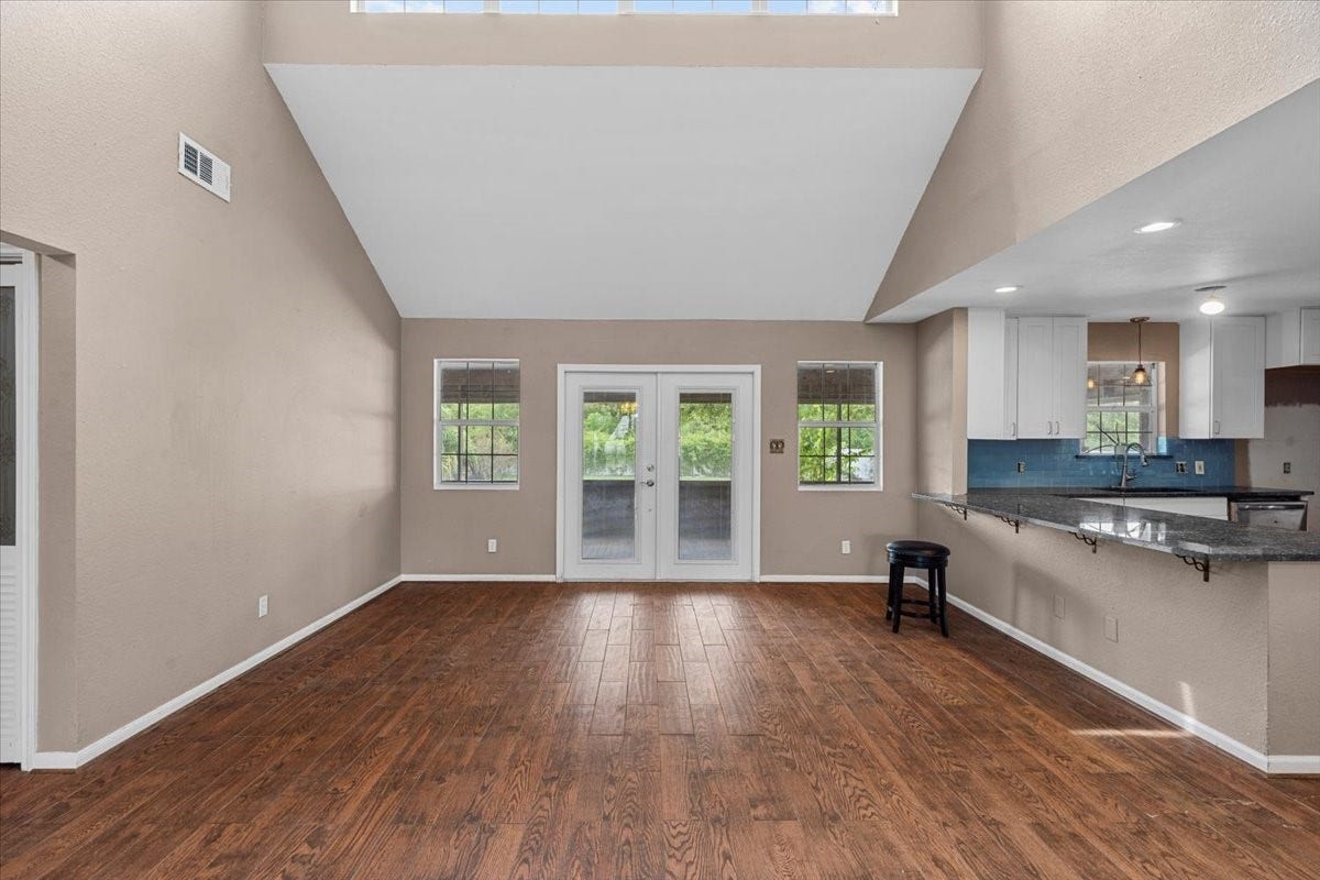7228 Avenue R, Santa Fe, TX 77510 Dining room area with breakfast bar in kitchen.