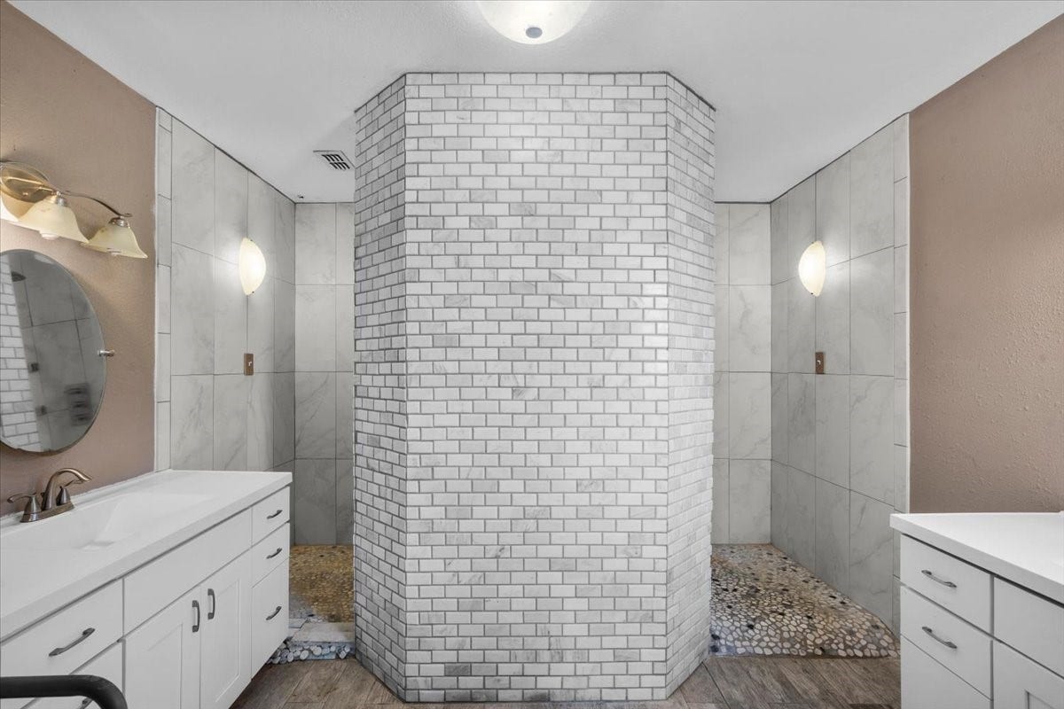 7228 Avenue R, Santa Fe, TX 77510 Primary bathroom with double sinks and large shower.