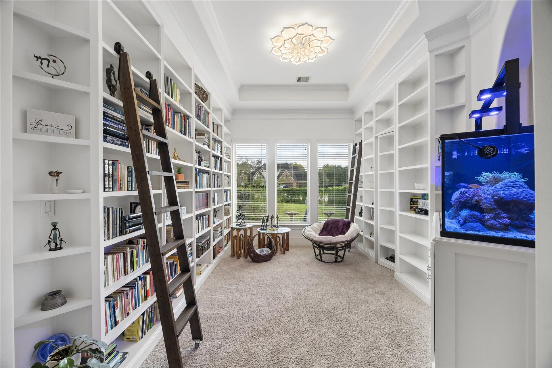 5018 Southampton Road, Missouri City, TX 77459 Grab a book and lets read! This library has floor to ceiling bookshelves and a hideaway door that leads you in the office/study.