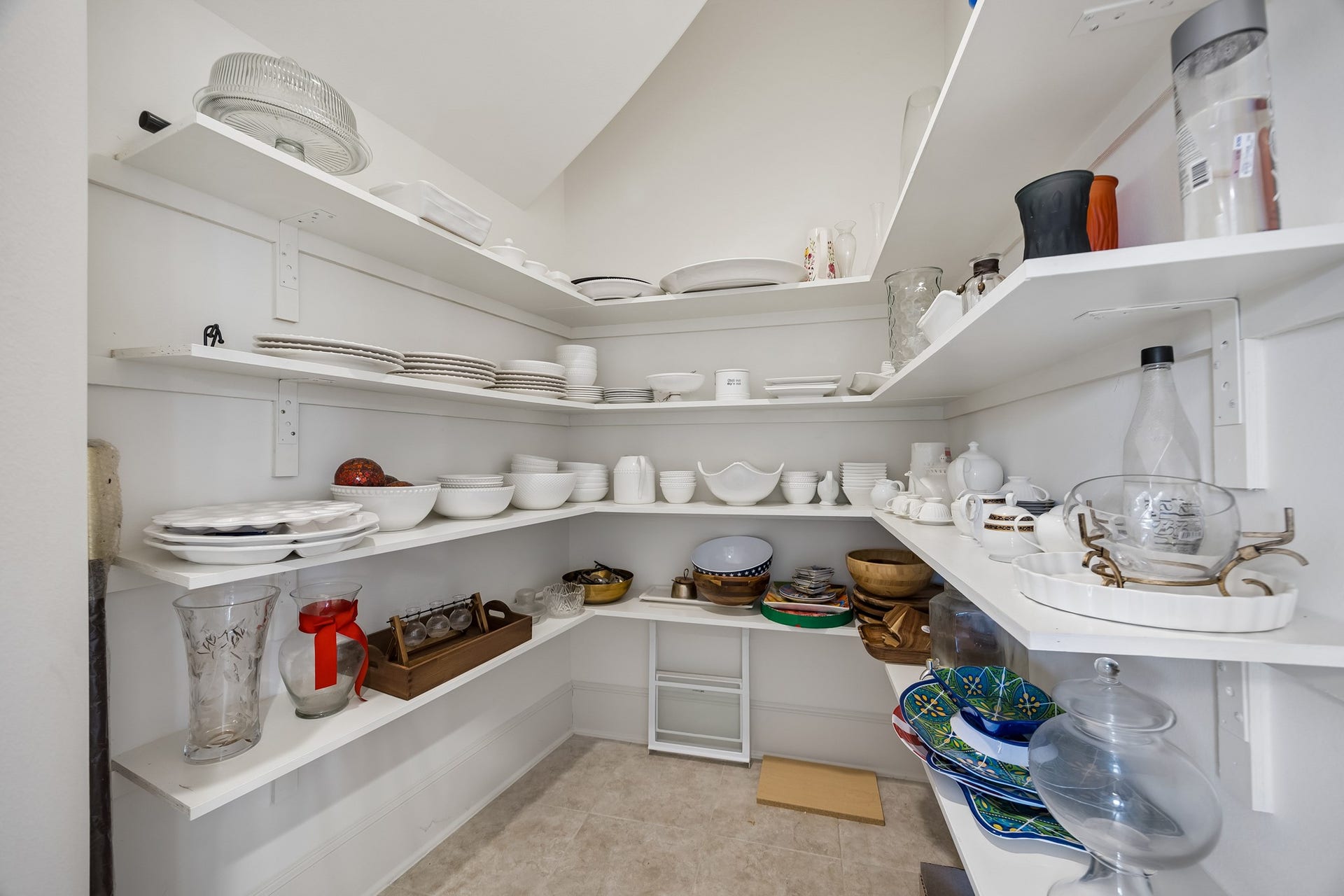 5018 Southampton Road, Missouri City, TX 77459 Spacious pantry with ample shelving, perfect for organizing dishes and kitchen essentials.
