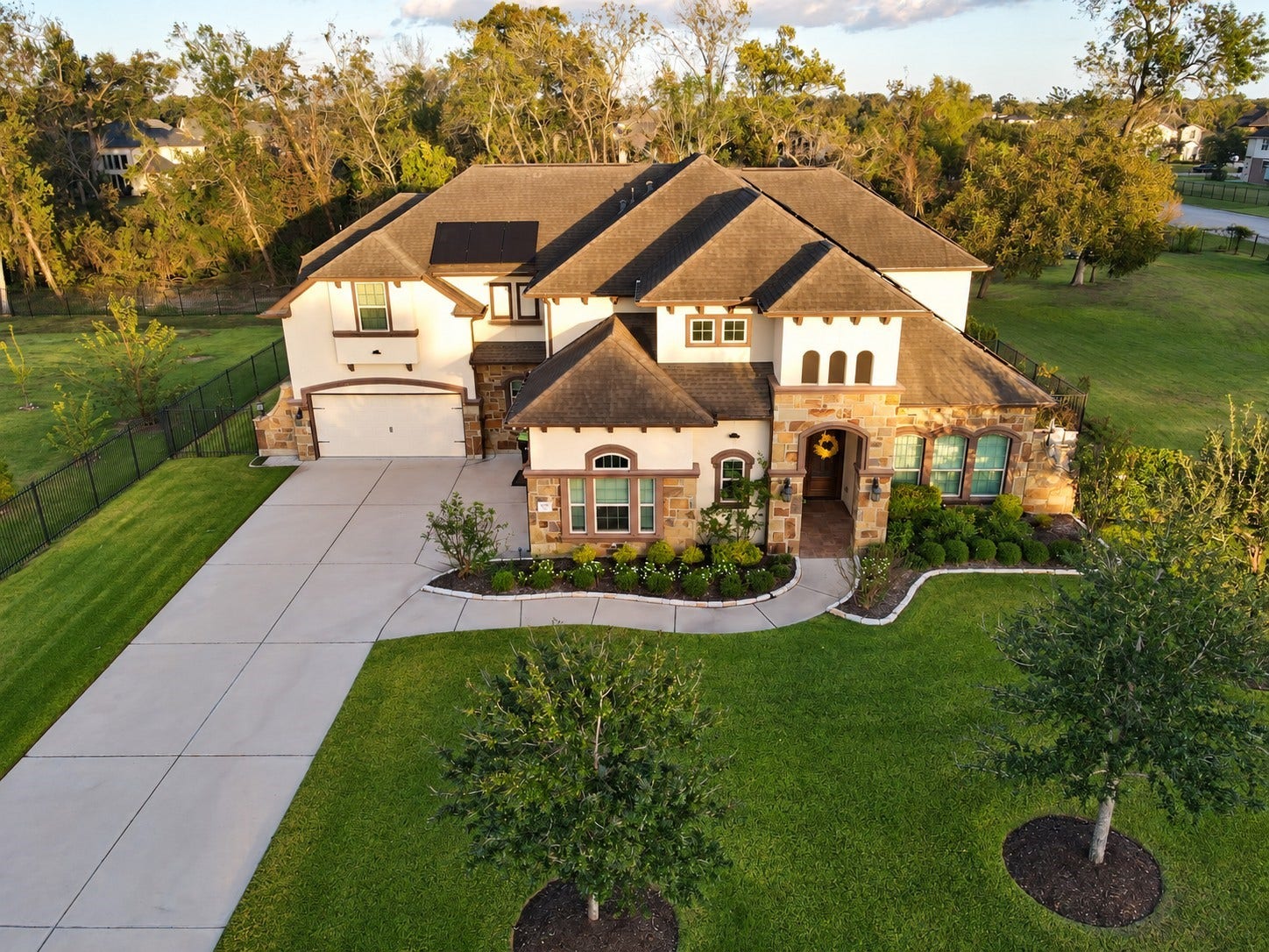 5018 Southampton Road, Missouri City, TX 77459 This stunning two-story home with elegant stone and stucco exterior, nestled on a spacious manicured lot is the perfect place to call home!