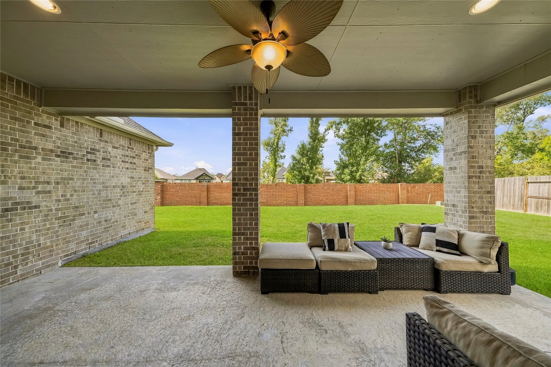10606 Novy Grove Drive, Missouri City, TX 77459 The oversized covered patio will become an extension of your living space. The patio has stamped concrete, a ceiling fan and recessed lighting. Also includes a gas connection, for a future grill or outdoor kitchen.
