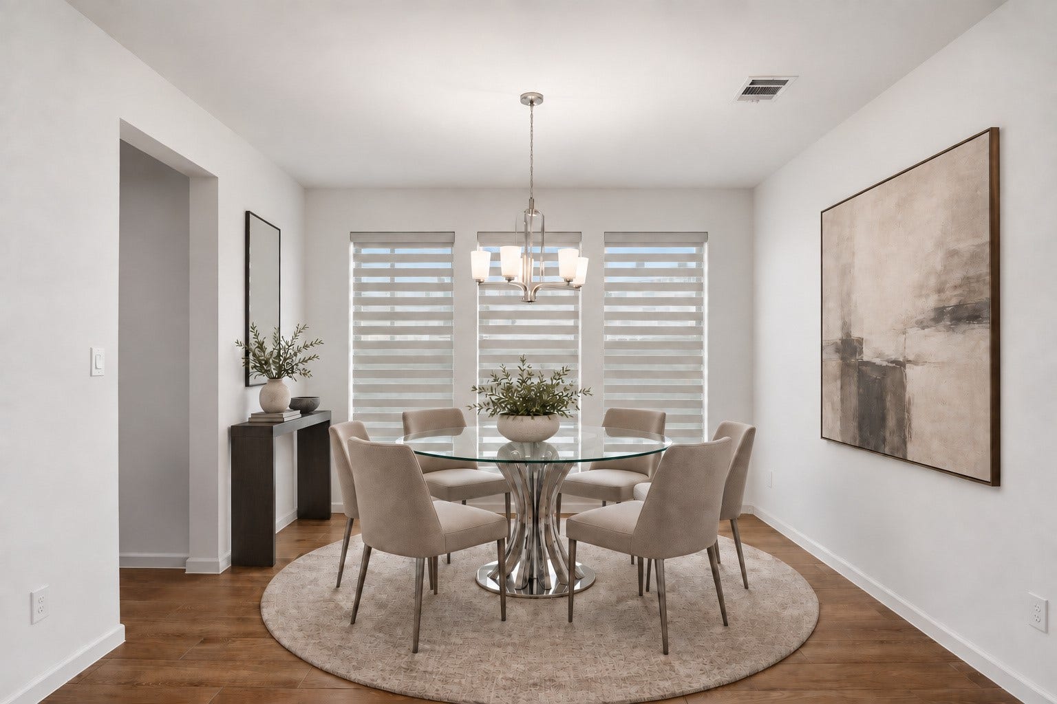 10606 Novy Grove Drive, Missouri City, TX 77459 The formal dining room has a passthrough opening to the kitchen. The professional "Zebra" window treatments ($9K upgrade) are both gorgeous and functional.