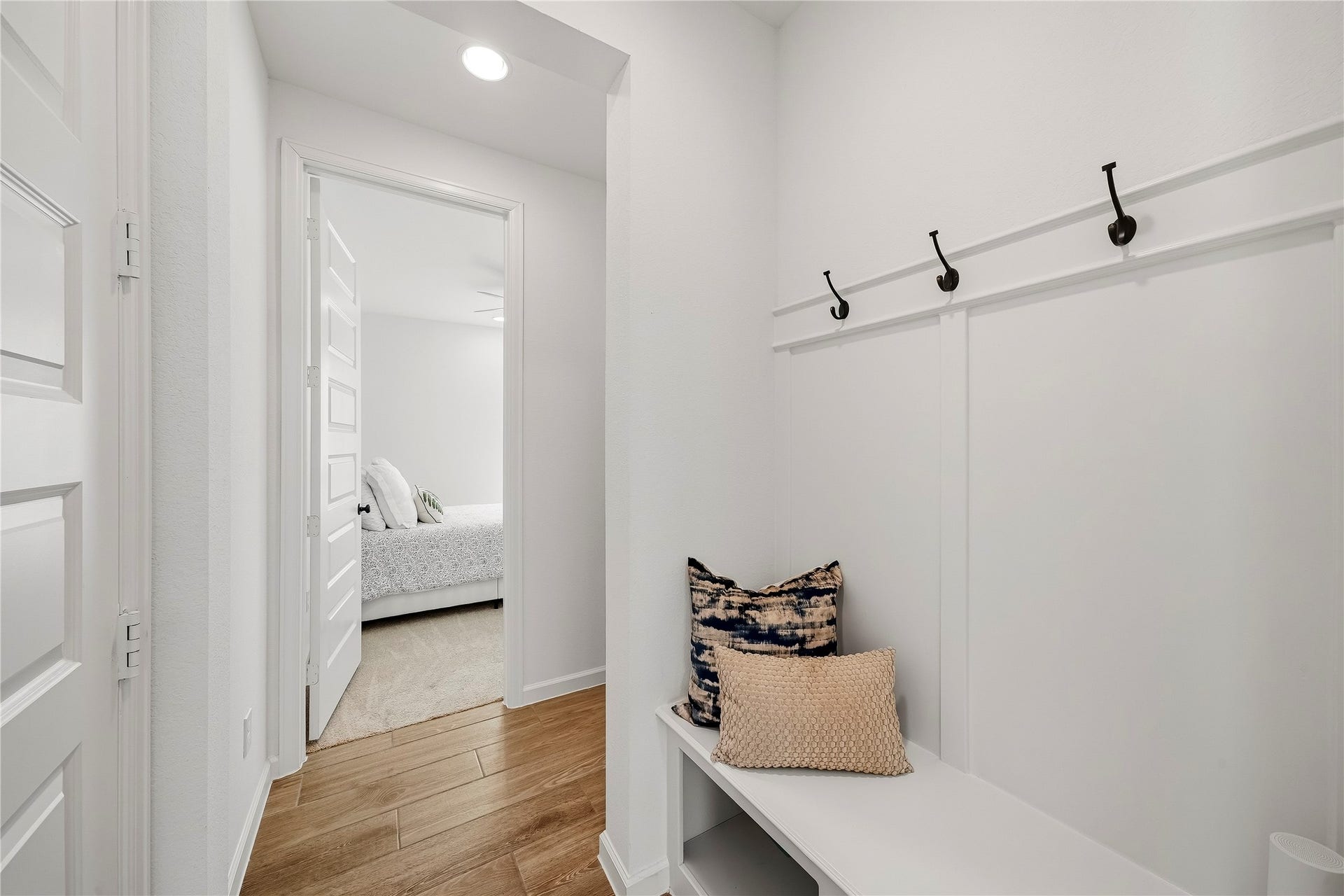 10606 Novy Grove Drive, Missouri City, TX 77459 The built-in "mud room" is located right off the entrance to the garage and just outside the second downstairs bedroom. It is the perfect niche to organize backpacks, baskets of shoes, etc.
