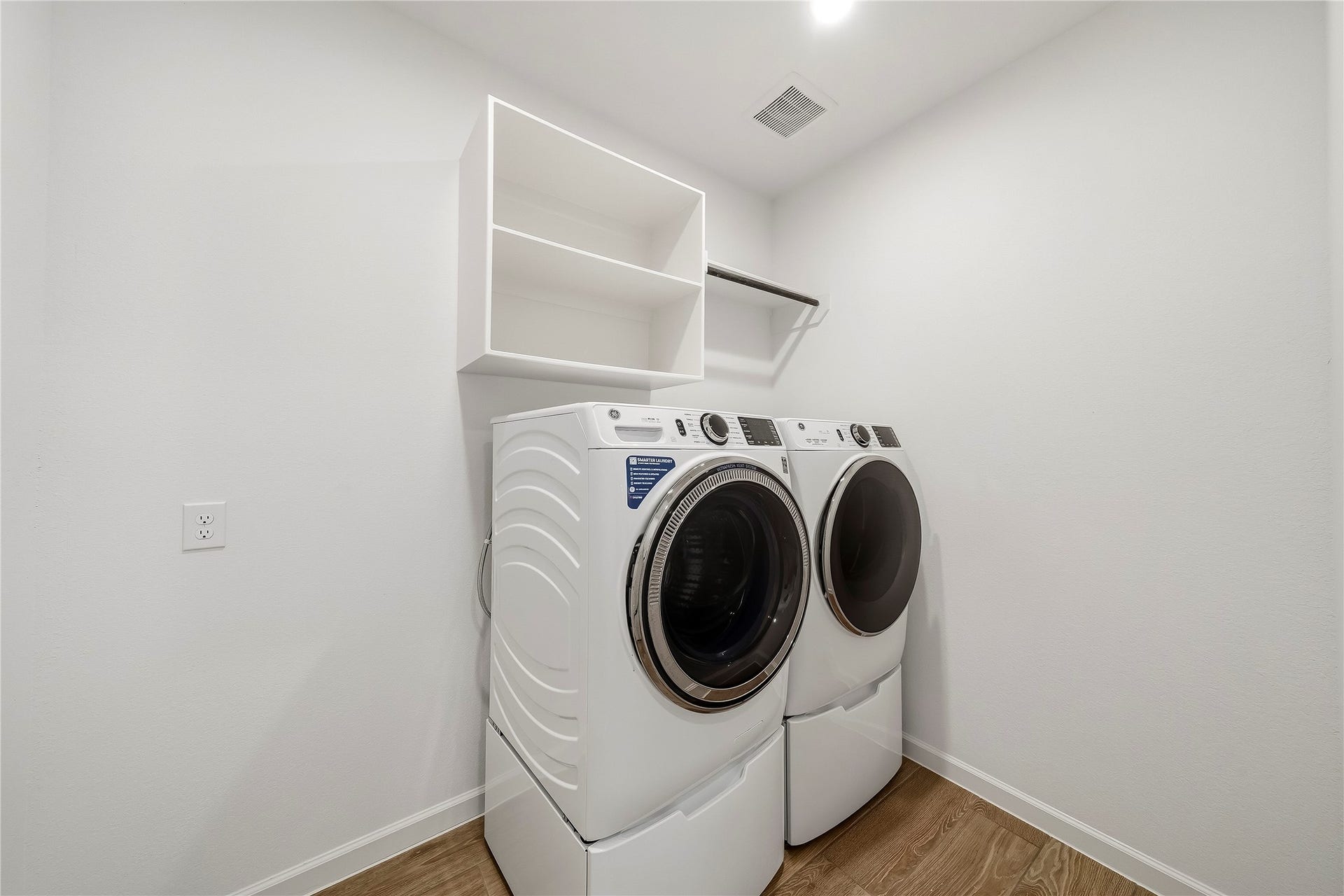 10606 Novy Grove Drive, Missouri City, TX 77459 The laundry room is located off the hallway near the "mud room." There is plenty of room for all your laundry needs, including a built-in for supplies. The best part...the GE washer & dryer ($3300), which have been used very lightly, are INCLUDED!