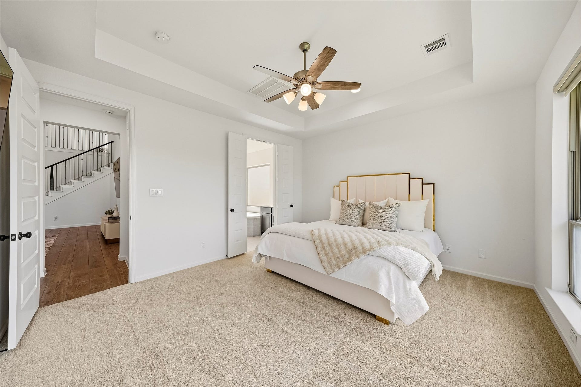 10606 Novy Grove Drive, Missouri City, TX 77459 The primary bedroom has a tray ceiling, ceiling fan and an ensuite primary bath.