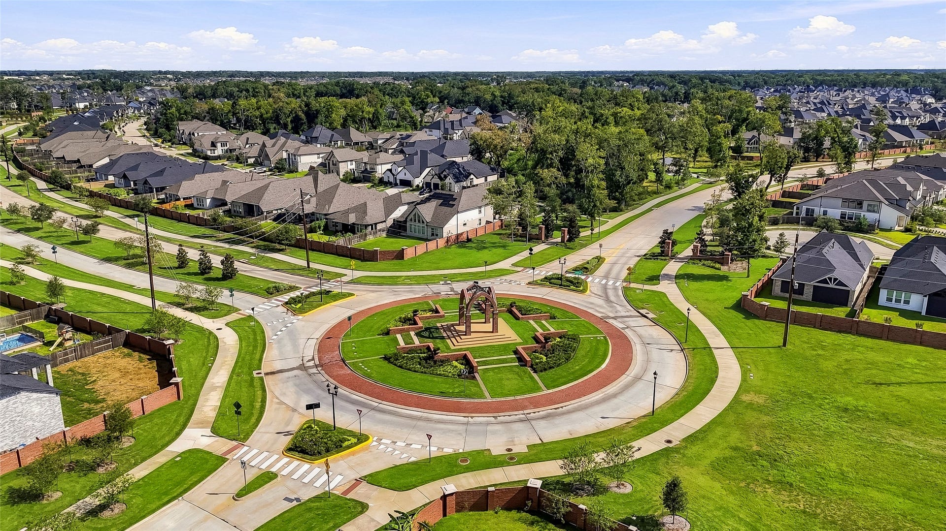 10606 Novy Grove Drive, Missouri City, TX 77459 Even the roundabouts, throughout the community, have architectural style!