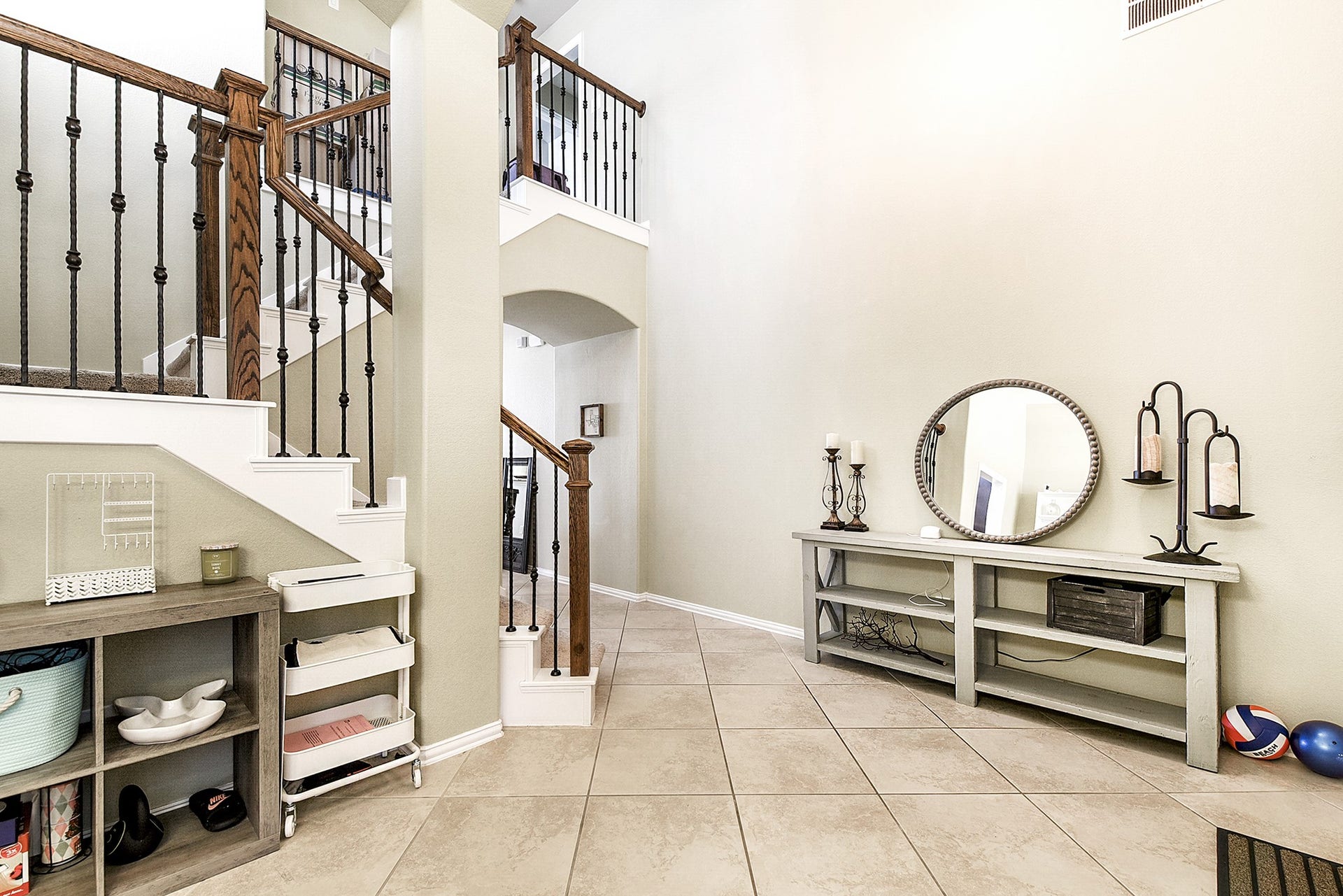 From the formal dining space, you'll enjoy a picturesque view into the foyer, showcasing the ample space and inviting atmosphere of the home.