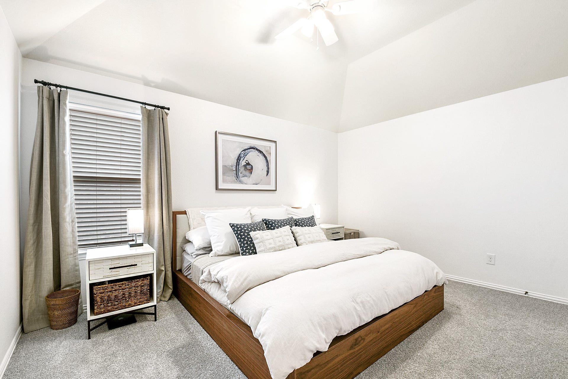 Upstairs offers three additional guest bedrooms, each generously sized with ample closet space. Take note of the large bedroom set that fits comfortably in one of the rooms, highlighting the spaciousness.