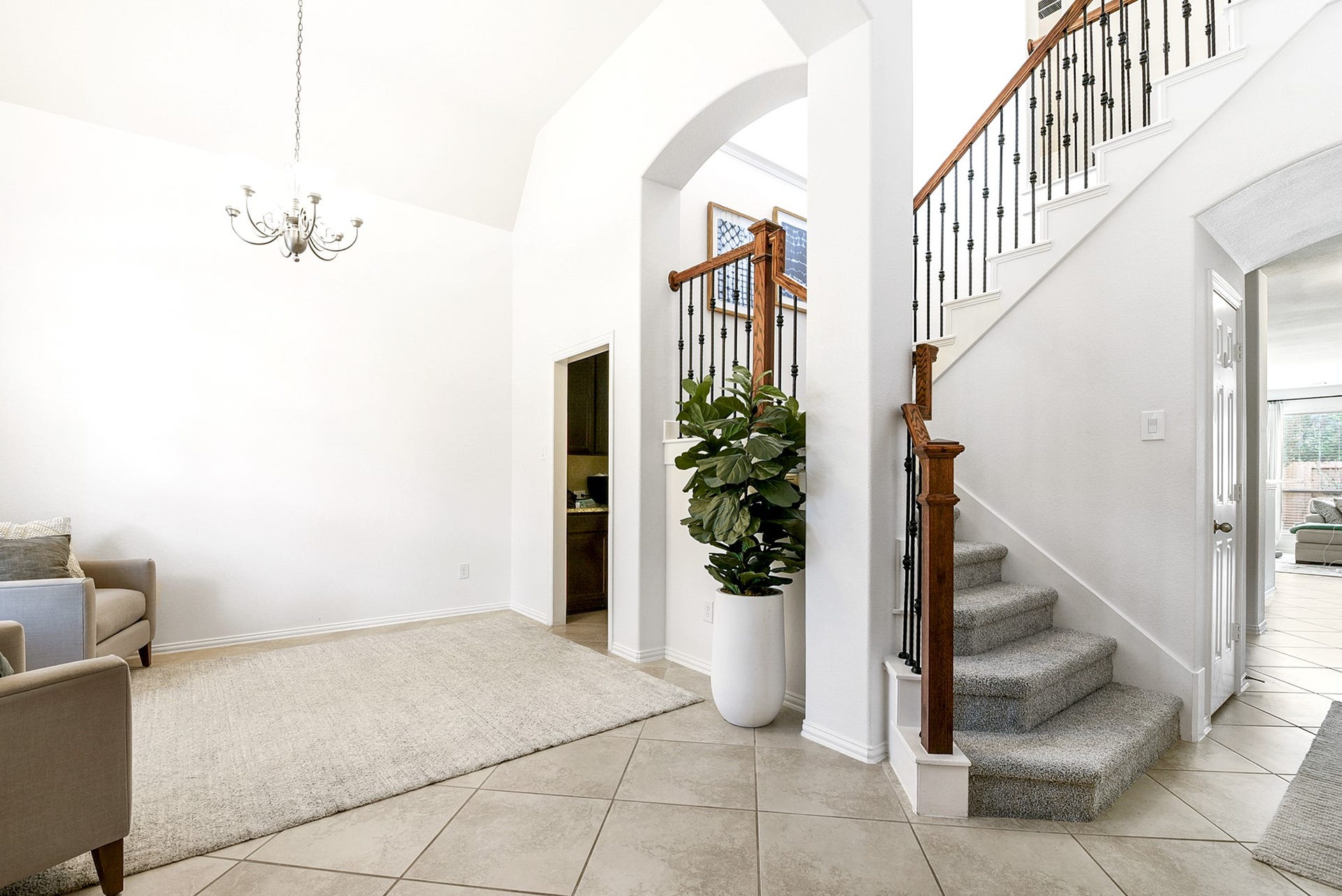 As you head upstairs, youll notice new carpeting throughout the staircase, as well as in the three bedrooms and game room. Almost the entire home has been freshly painted in a neutral white.