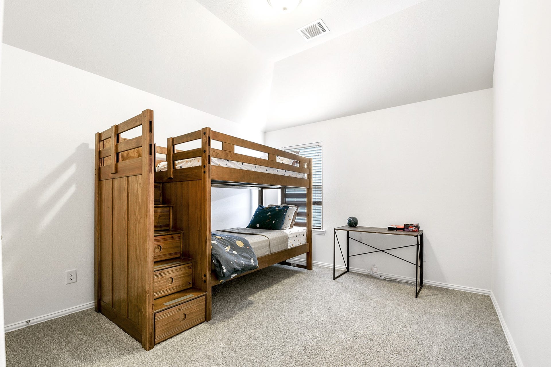 This is the third guest bedroom, which, like the others, offers generous space. Each bedroom is well-sized, ensuring comfort for guests.