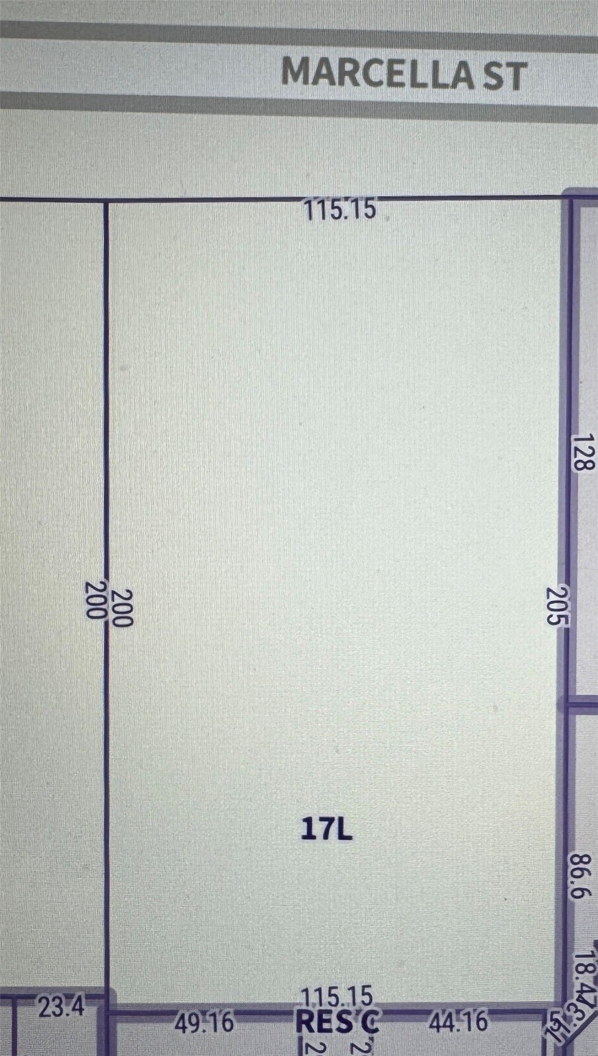 511 Marcella Street, Houston, TX 77091 Prime vacant lot measuring approximately 115 feet by 205 feet.