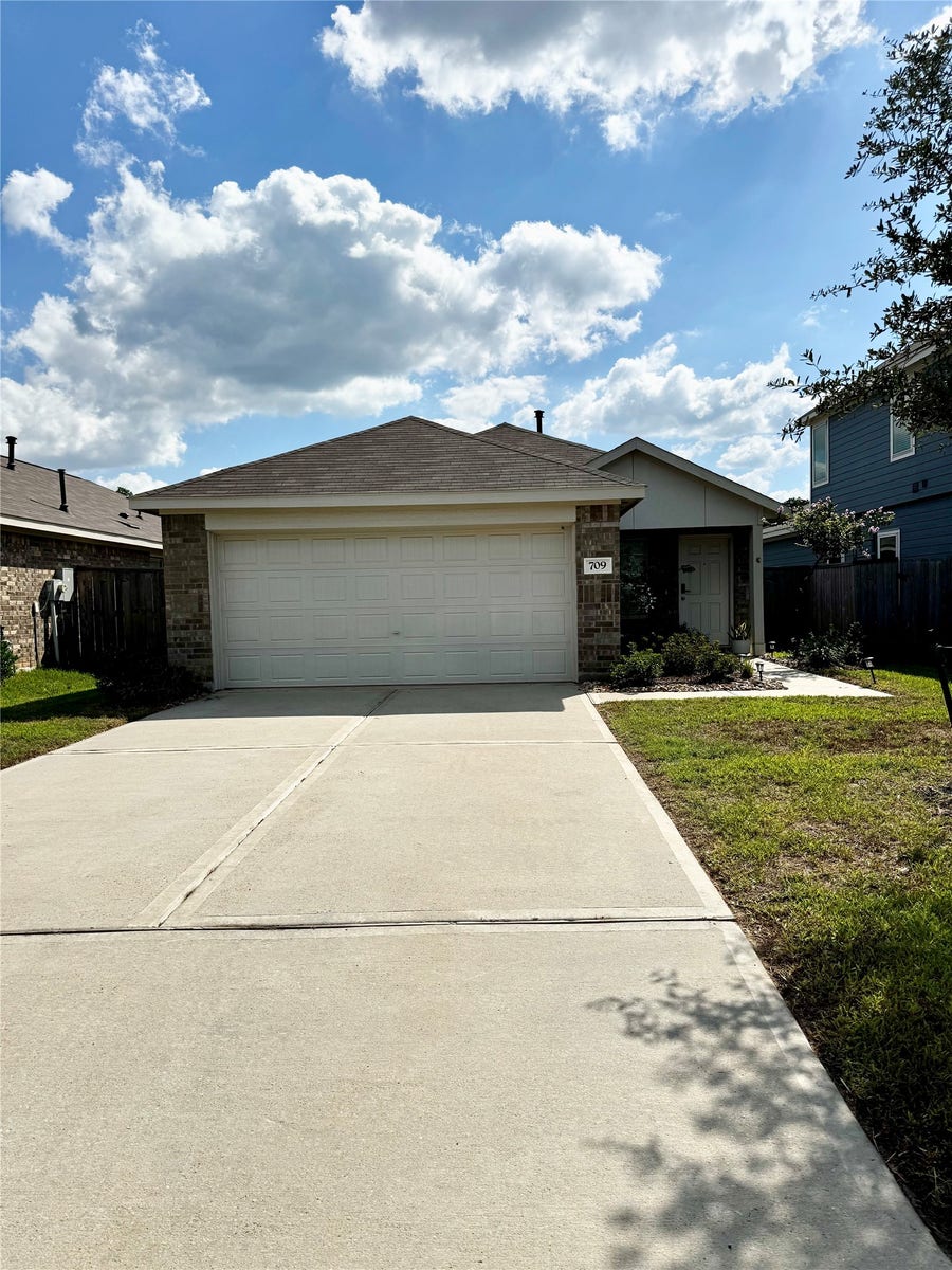 Property photo for 709 Roaring Falls Drive, Willis, TX